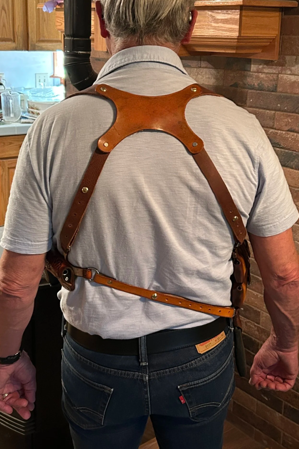 Back view of a leather shoulder holster