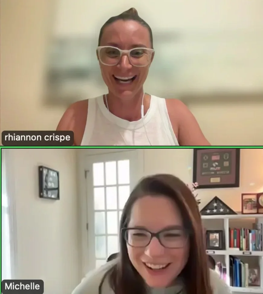 Two women smiling during a video call. The woman on top has glasses and is wearing a white sleeveless shirt, while the woman at the bottom has glasses and is in a room with bookshelves and framed items in the background.