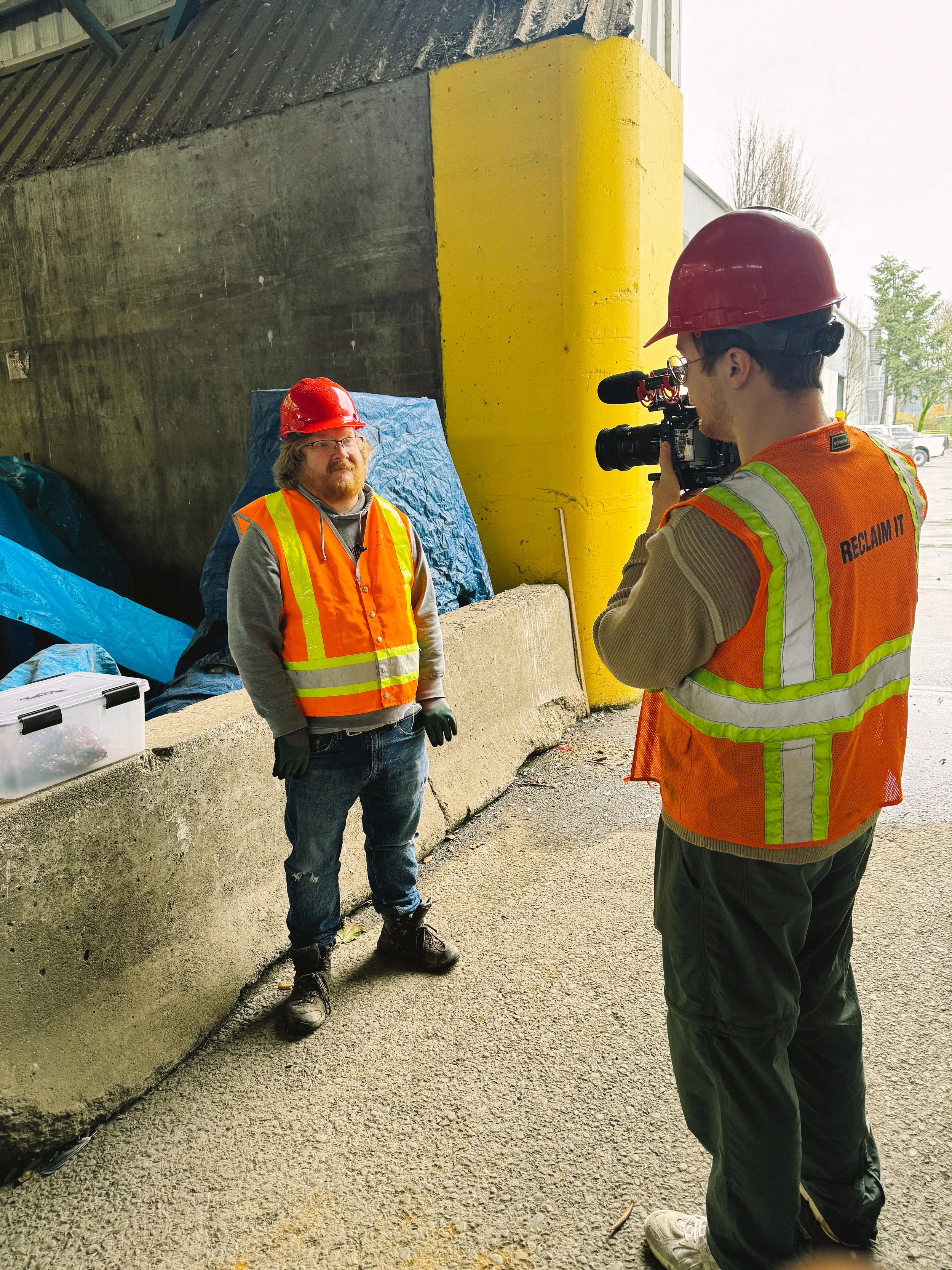 Videographer filming interviews for a nonprofit brand story video in Portland.