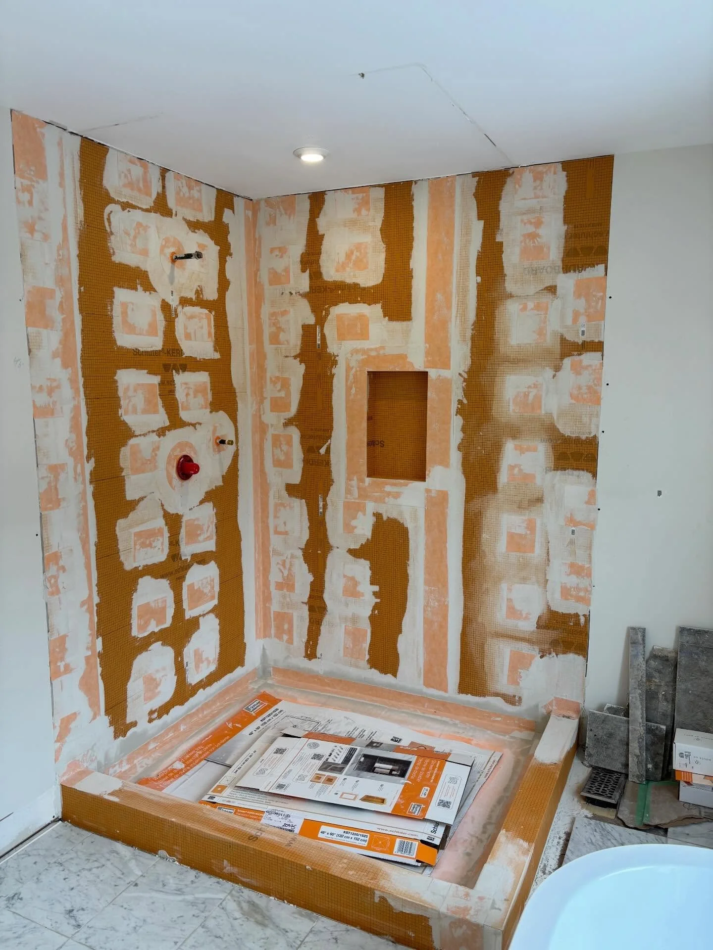 Swipe to watch the progress on the #georgetownshower! Only a few short weeks left until our clients will be able to enjoy their brand new leak free shower! @schlutersystemsna water proofing, tile supplied by @factorytile! Stay tuned for the final res