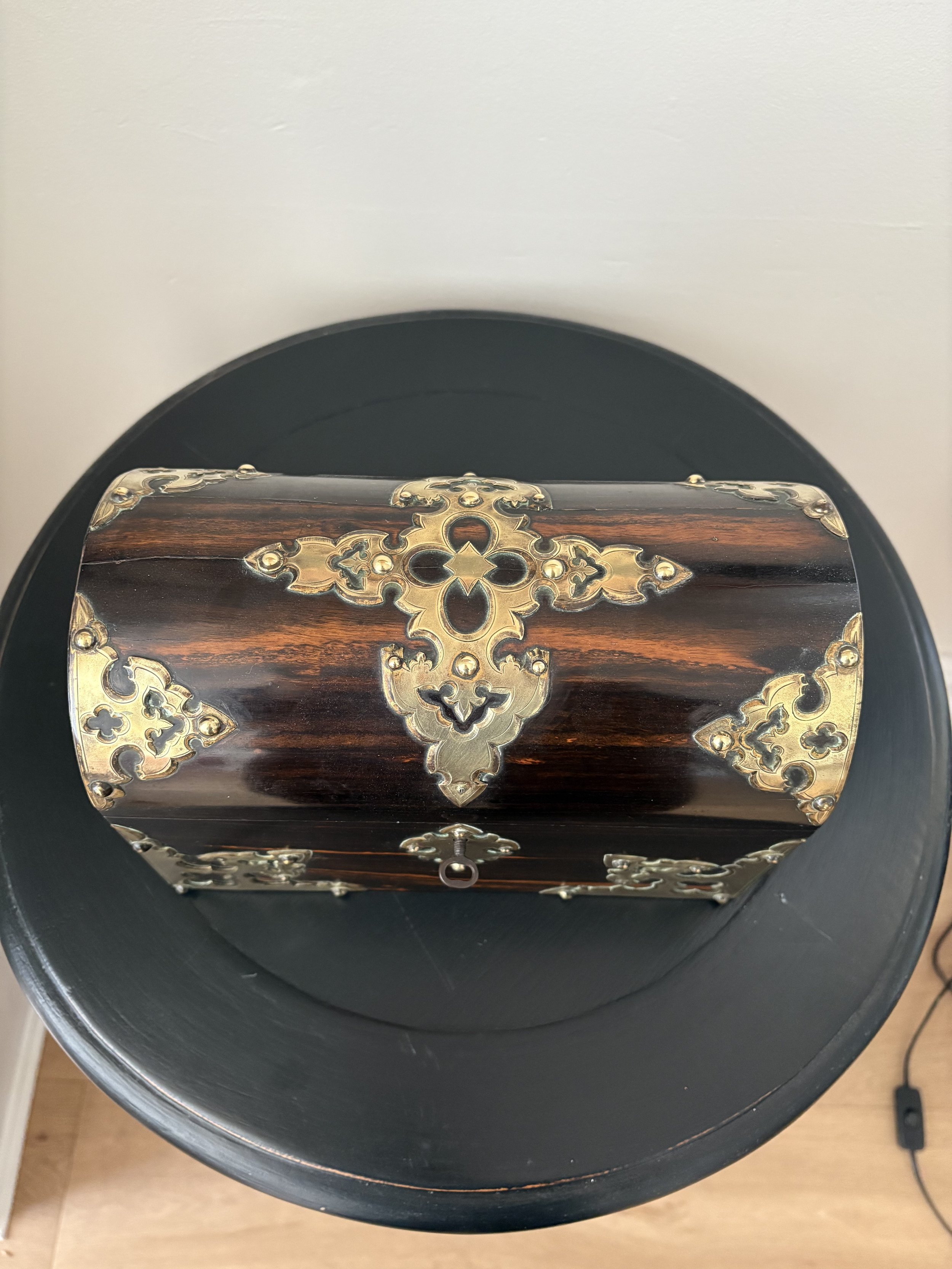 Image 2 of 3 -
Calamander Wood - a rare, exotic hardwood found predominantly in India; a near perfect moire silk interior and exquisite hand-chased brass decoration with an ecclesiastical inspiration - it’s really all a bit overwhelming.
Possibly cra