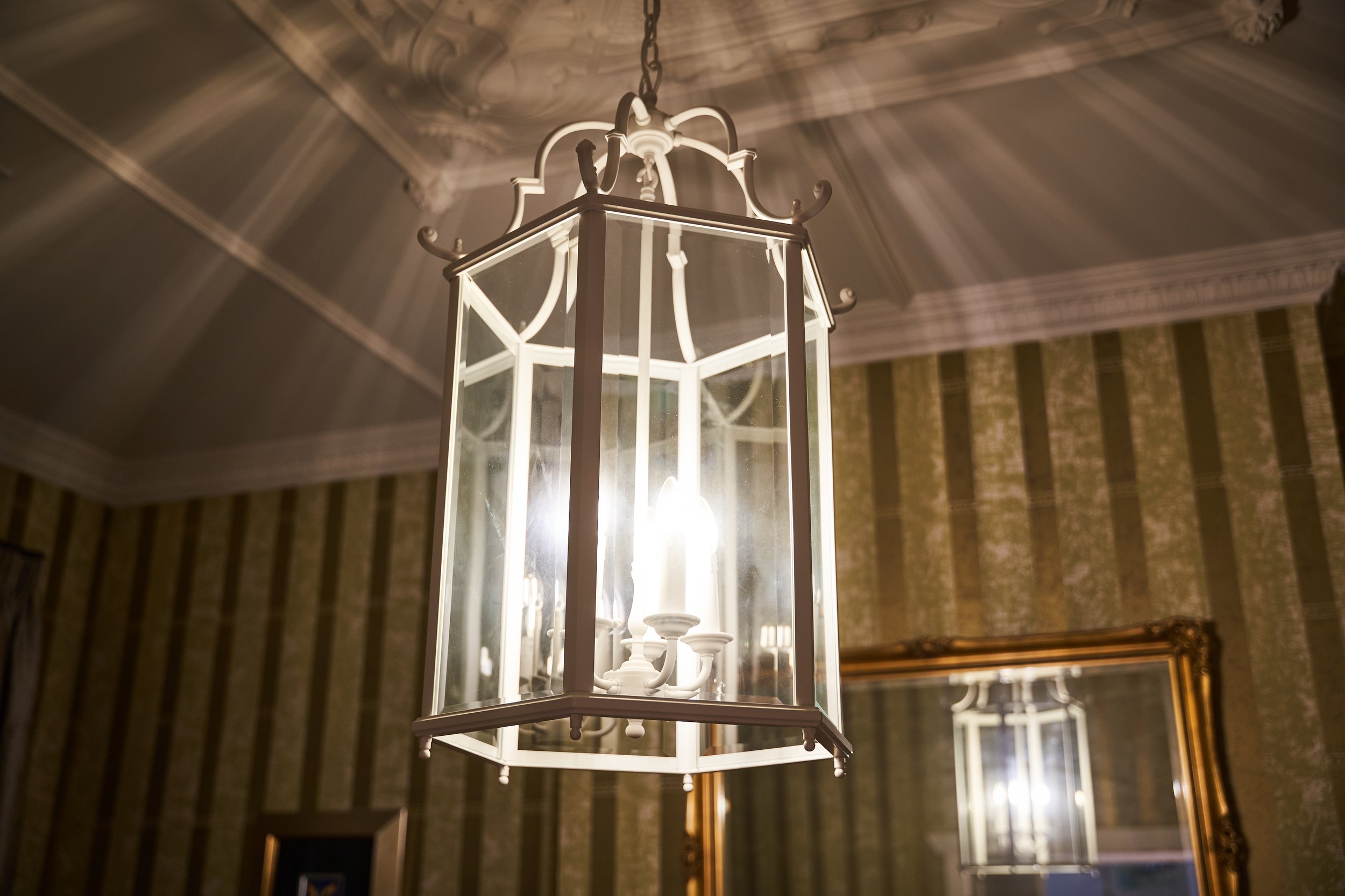 Chinois Iron Lantern with white painted finish commissioned for the projct  by one Rundle Interiors. 