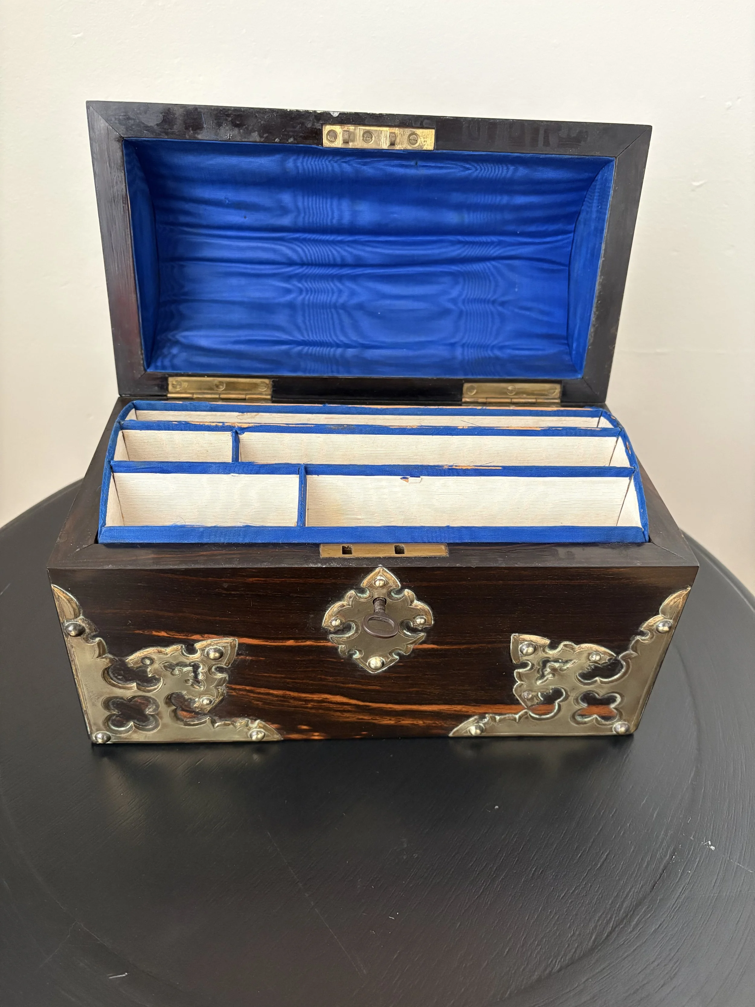 Image 3 of 3 -
Calamander Wood - a rare, exotic hardwood found predominantly in India; a near perfect moire silk interior and exquisite hand-chased brass decoration with an ecclesiastical inspiration - it’s really all a bit overwhelming.
Possibly cra