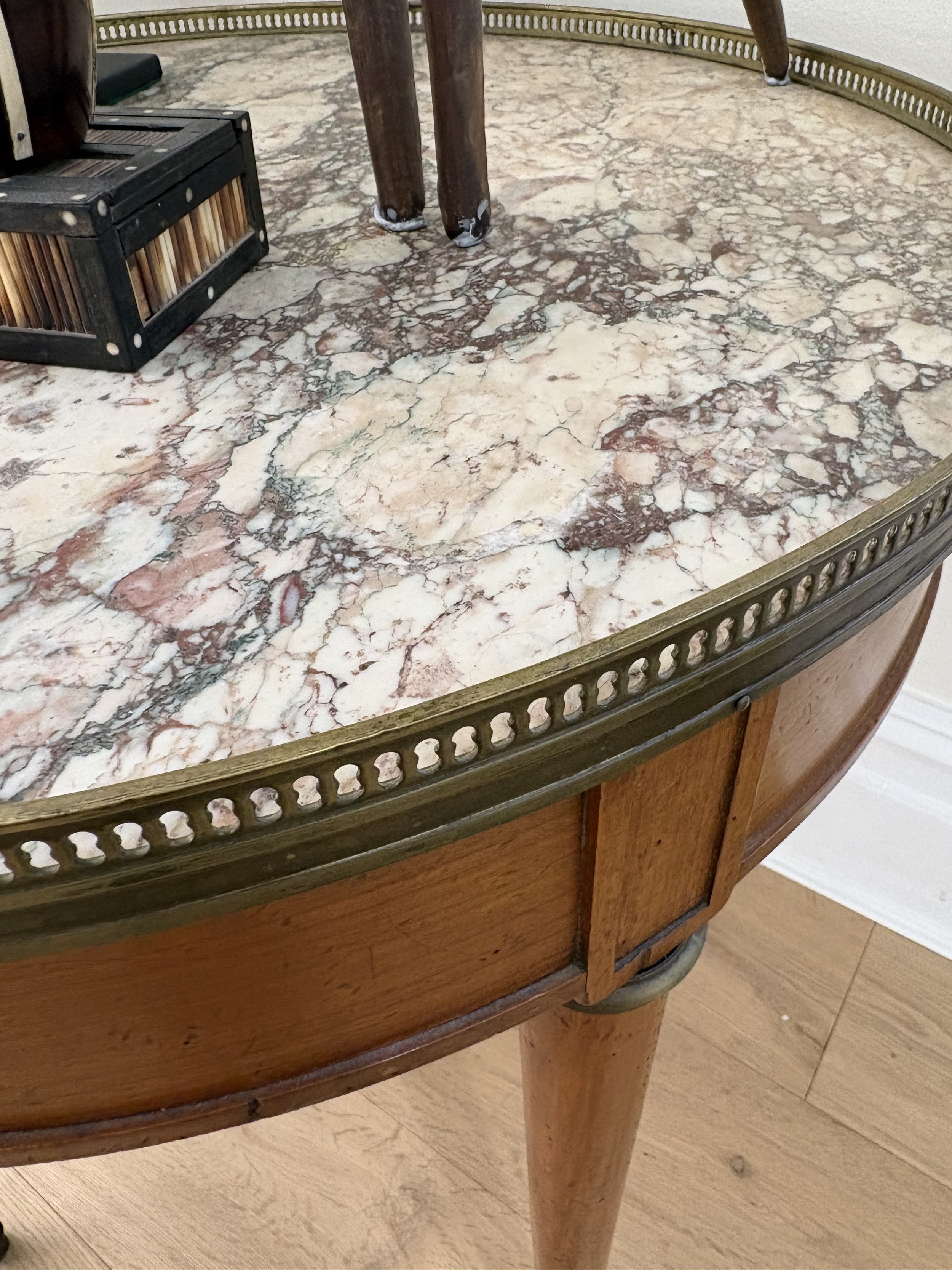 *SOLD* Image 2 of 3
French marbled-top salon table (1870-1880),  most likely designed to be centrally placed with twin drawers. In near perfect condition. $1, 800 (70 x 65).