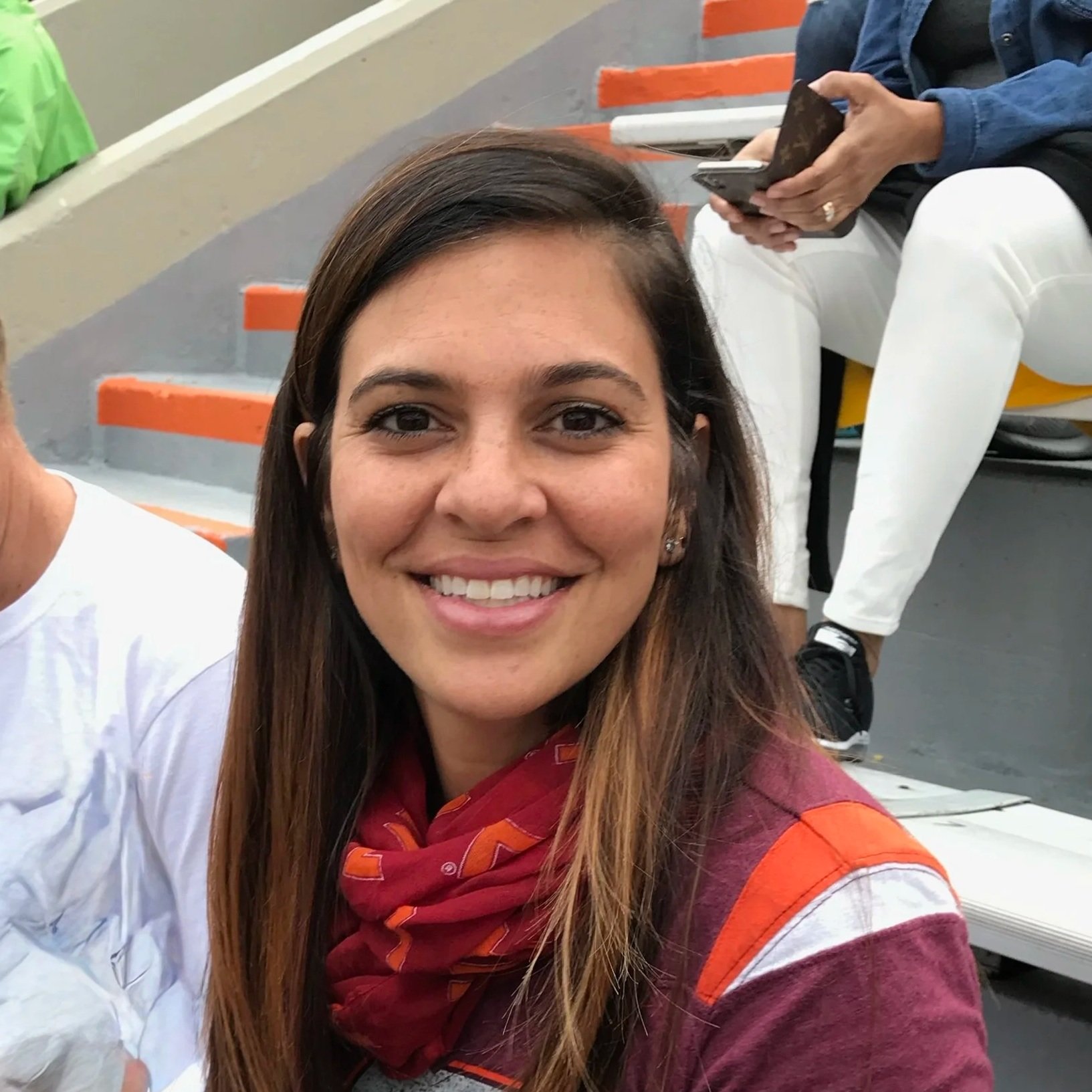 Mavericks Football Club logo with black, white, and orange colors, featuring a rose in center and three stars above.