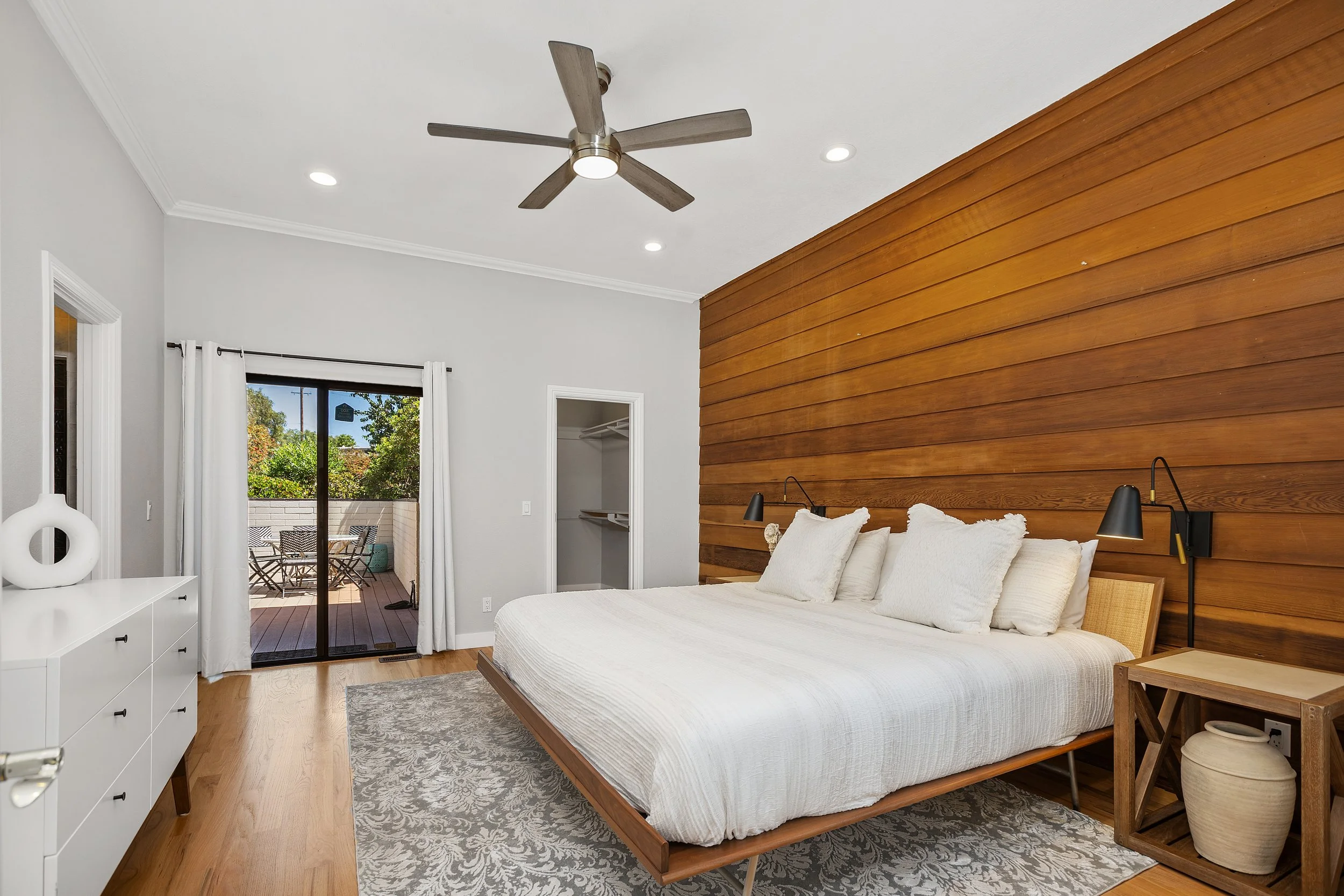 Primary suite with walk-in closet and two outdoor spaces