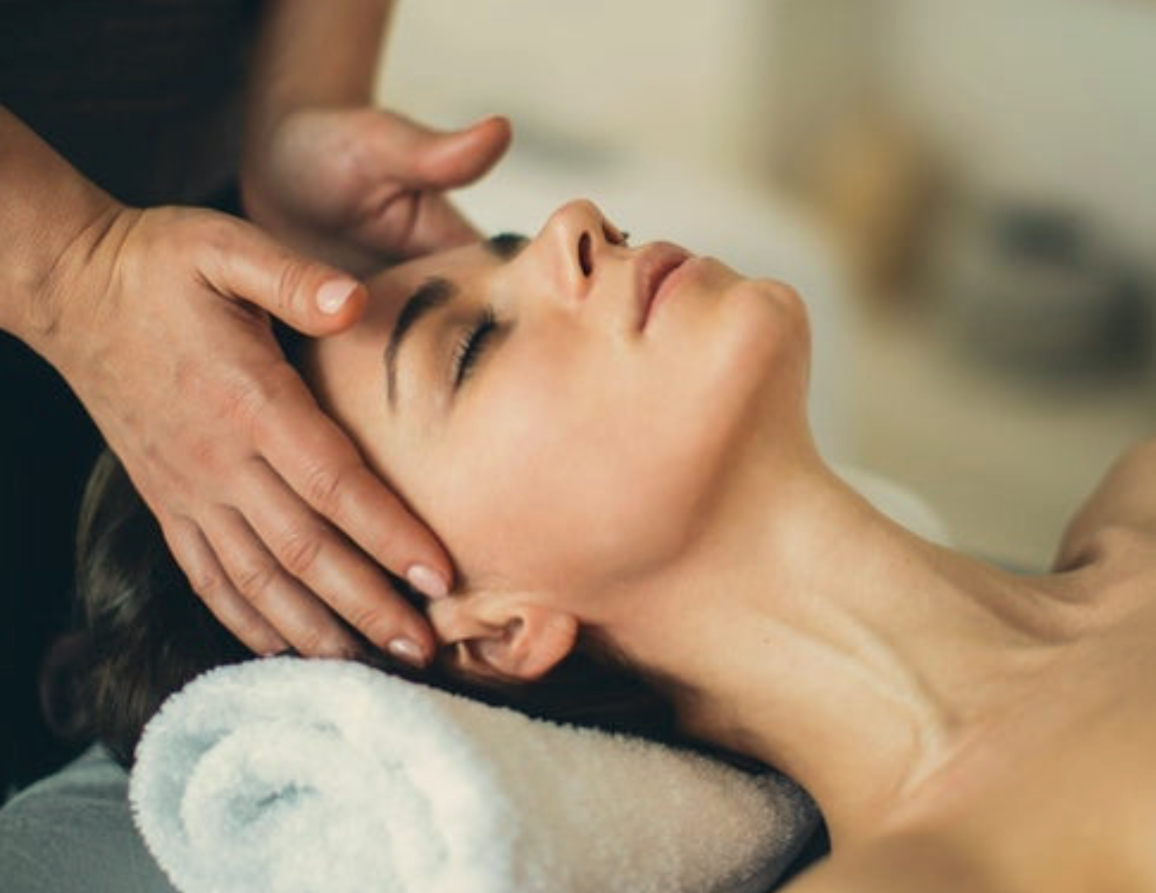 Woman receiving a scalp treatment