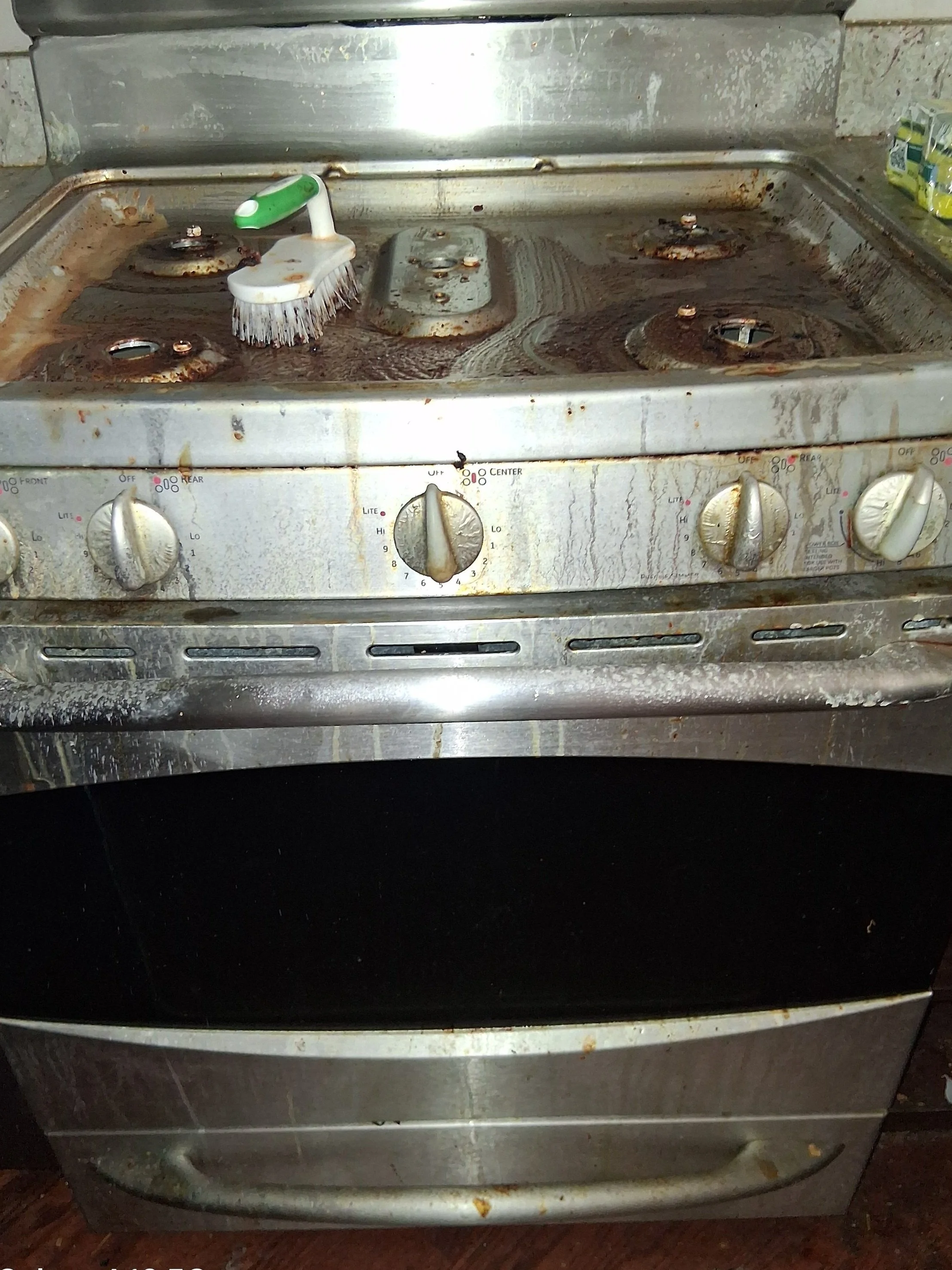 Before Image of Grease-Stained Oven