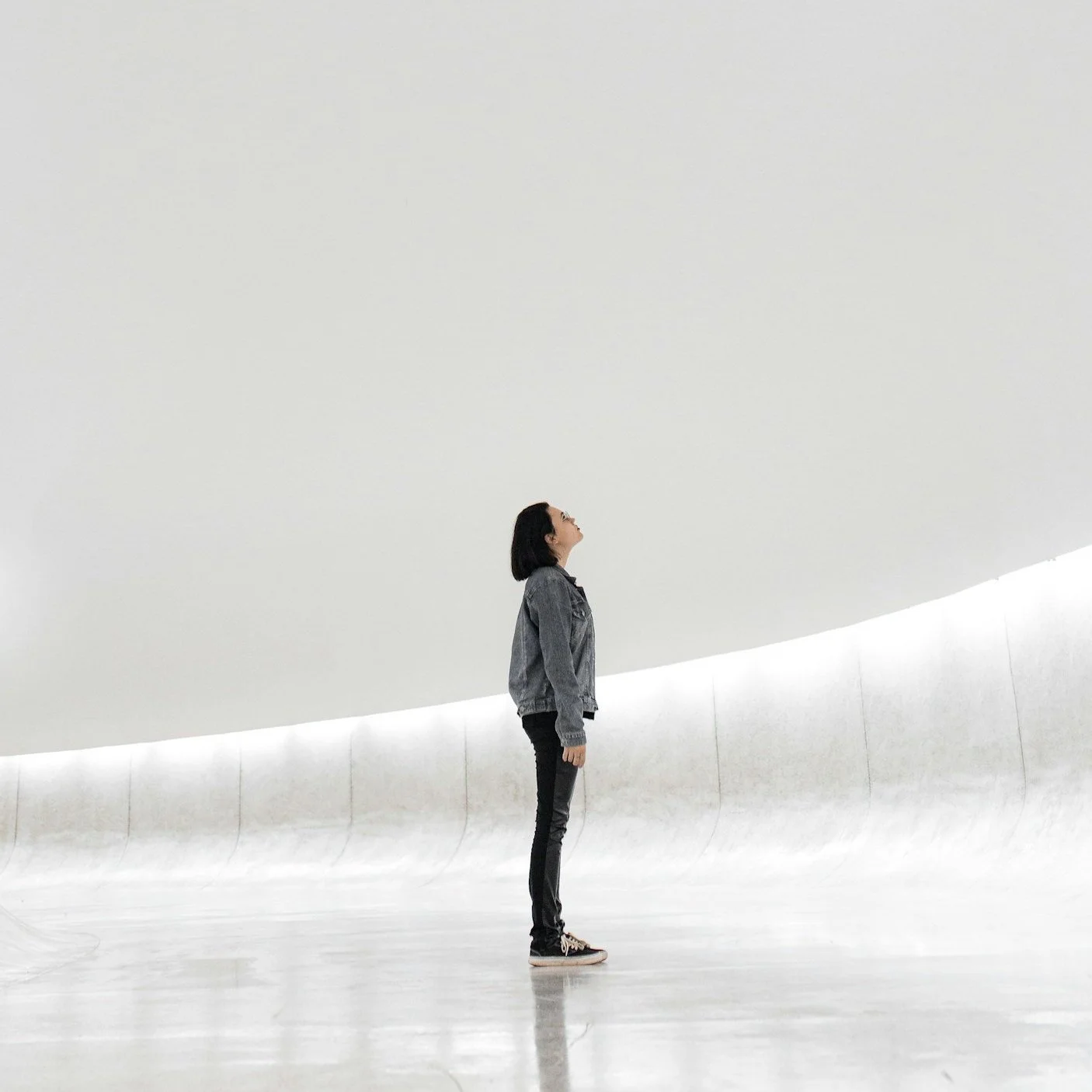 Looking up for illumination and guidance on her path.
