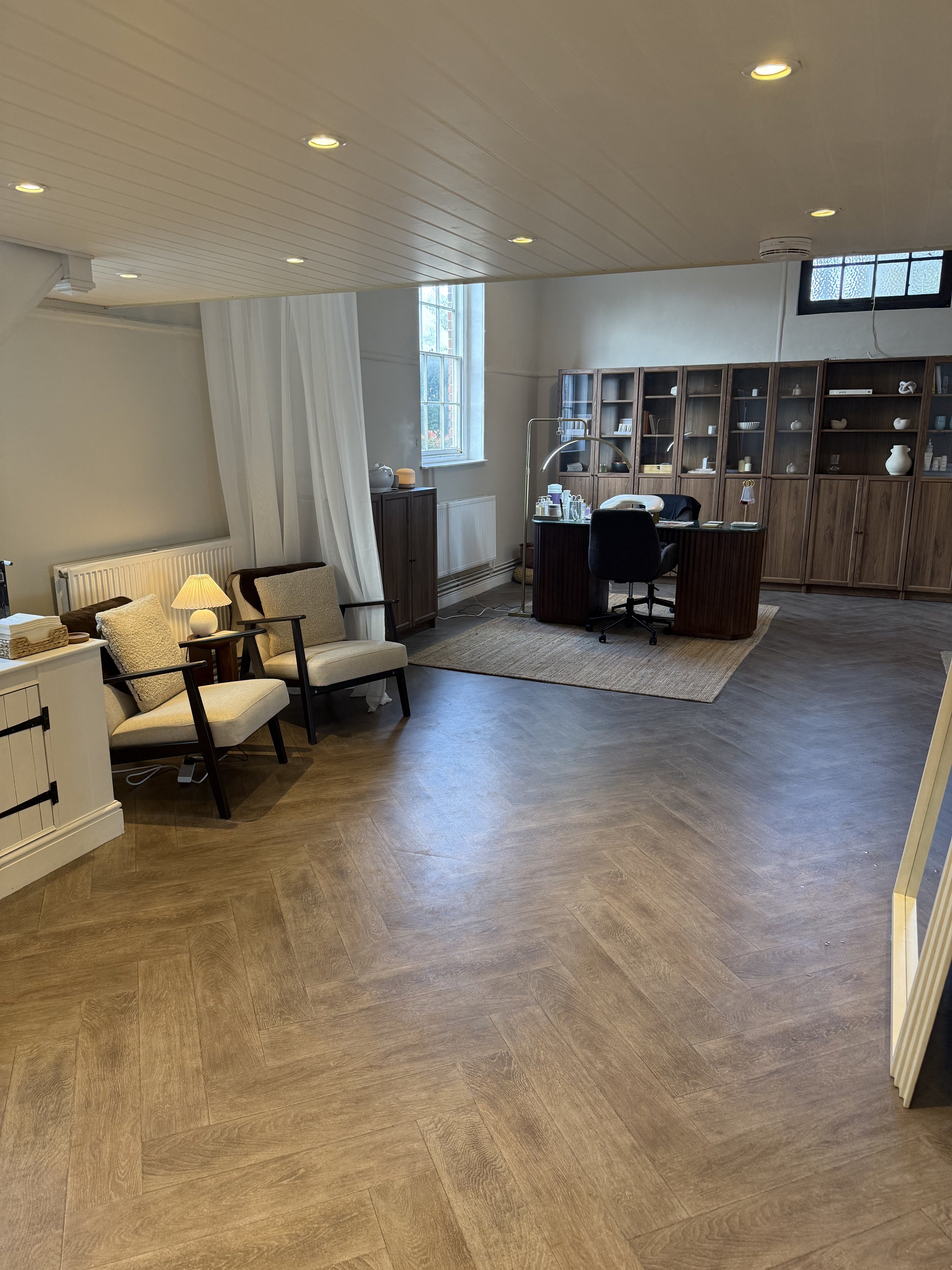 Aesthetic Clinic picture with beautiful, warm and modern furniture and soft furnishings to create the clinic space