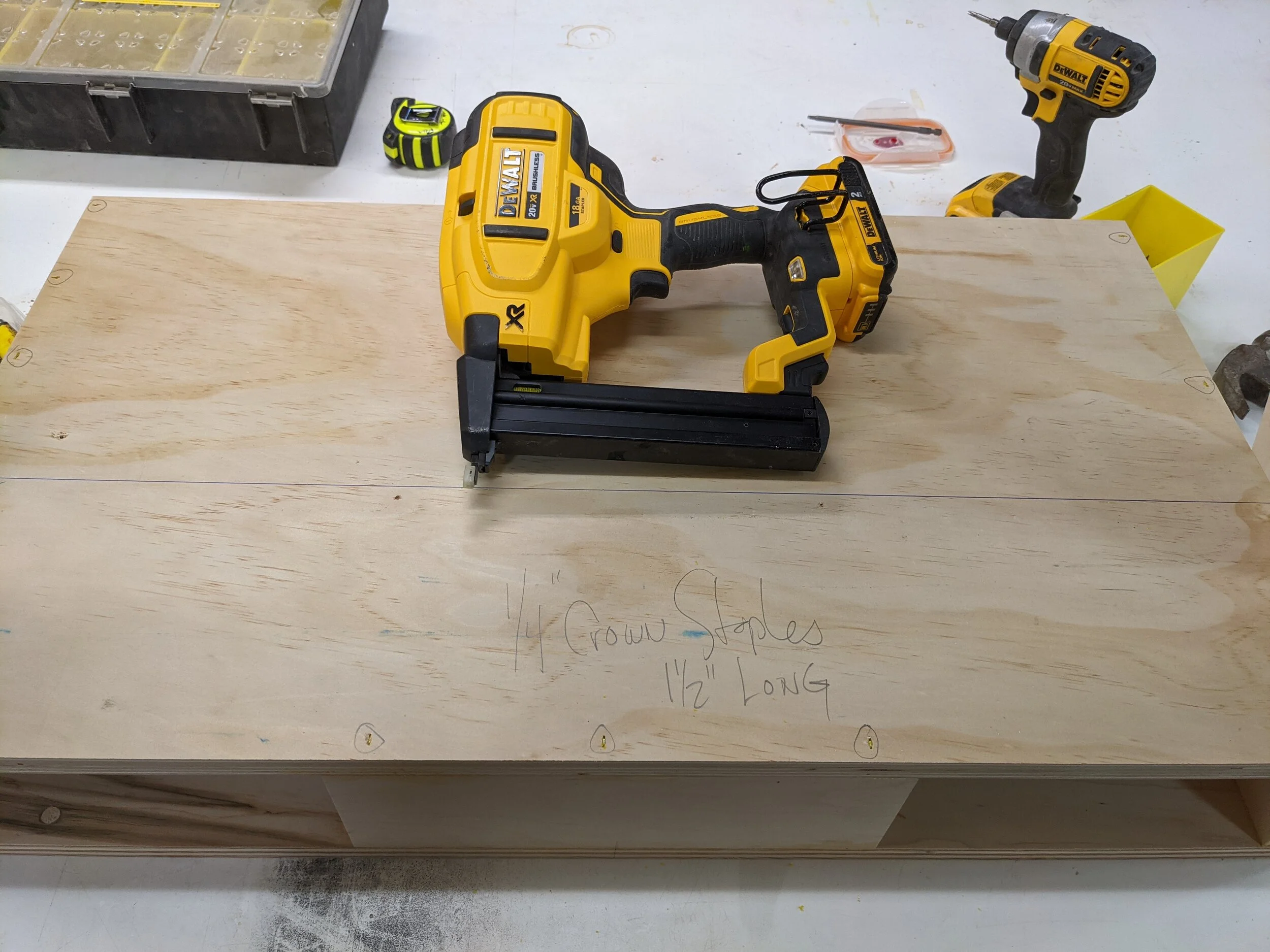 We use 1-1/2” Narrow crown staples to fasten the bottom but 1-1/4” Screws would work too.