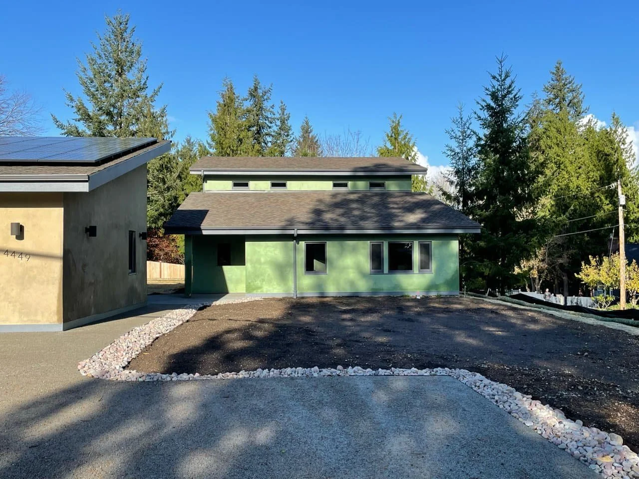 Net-Positive Faswall and Structural Insulated Panel Home