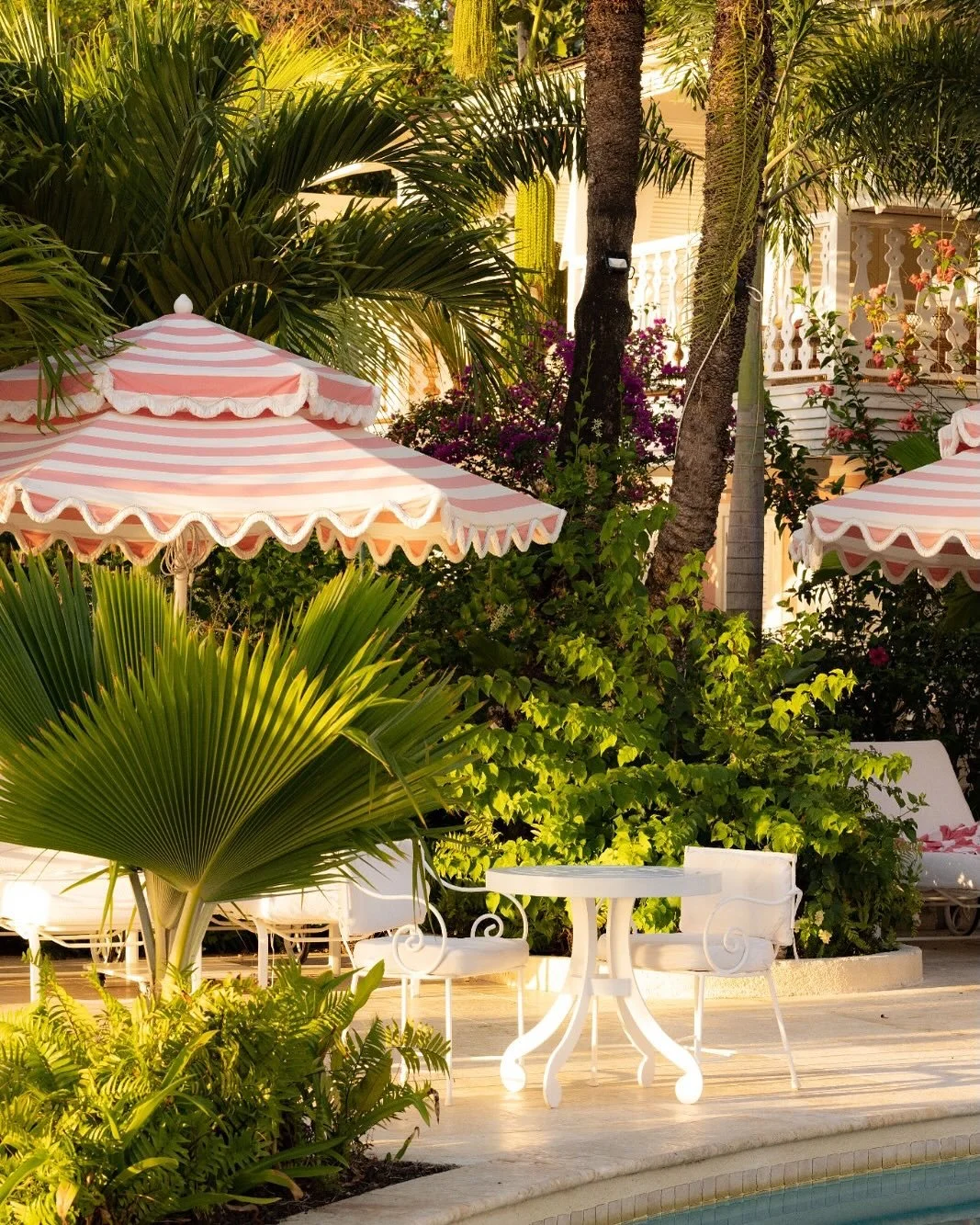 Next up in our Valentine&rsquo;s series is Cobblers Cove @cobblerscovehotel This hotel takes pole position for most romantic exterior. The iconic pink fa&ccedil;ade of the historic main house, paired with the whimsical pastel-striped parasols makes i