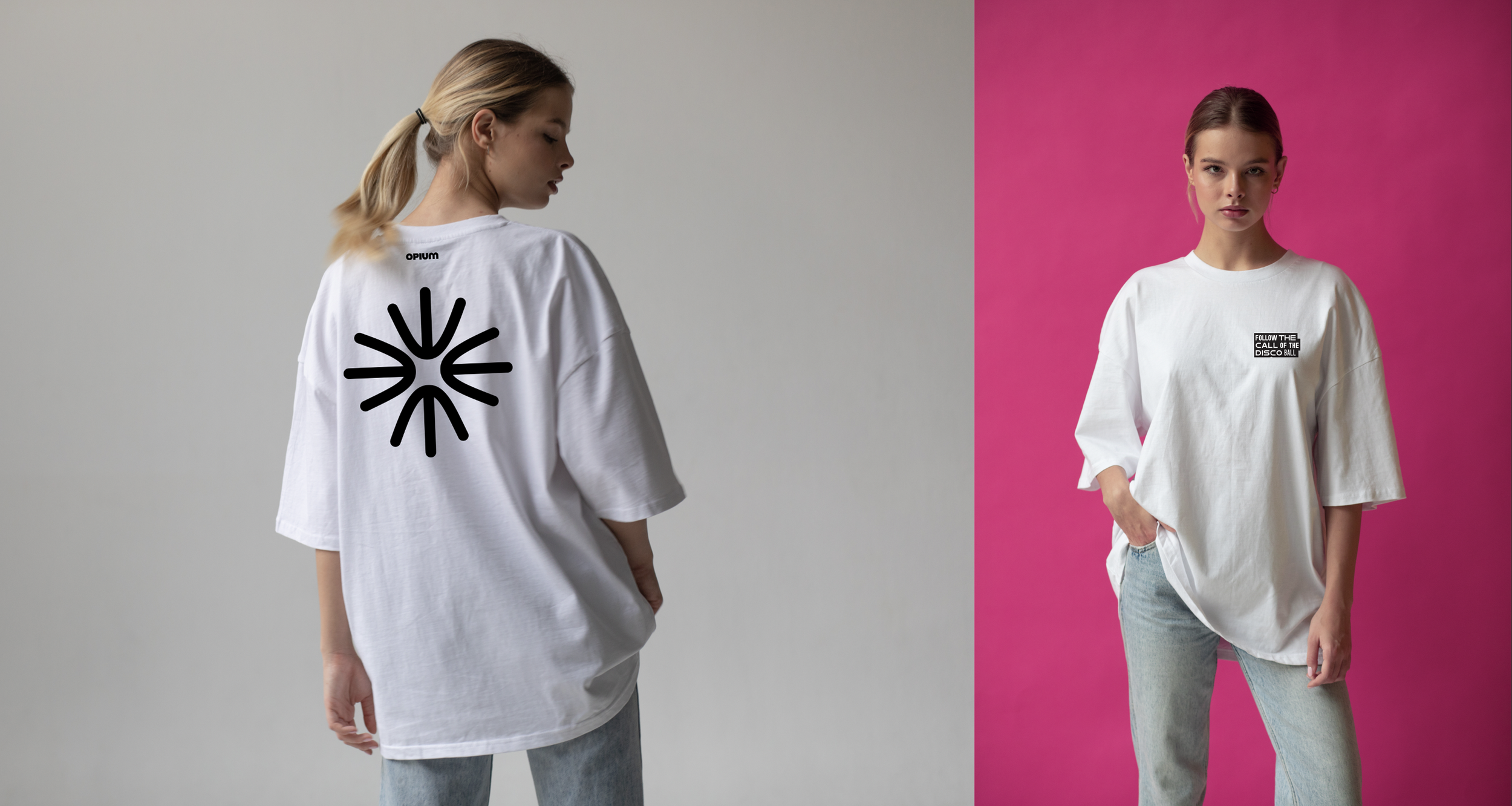 Two young women modeling white oversized t-shirts; one with a large black circular graphic on the back, and the other with a small black text box on the front, standing against plain backgrounds, one gray and one pink.