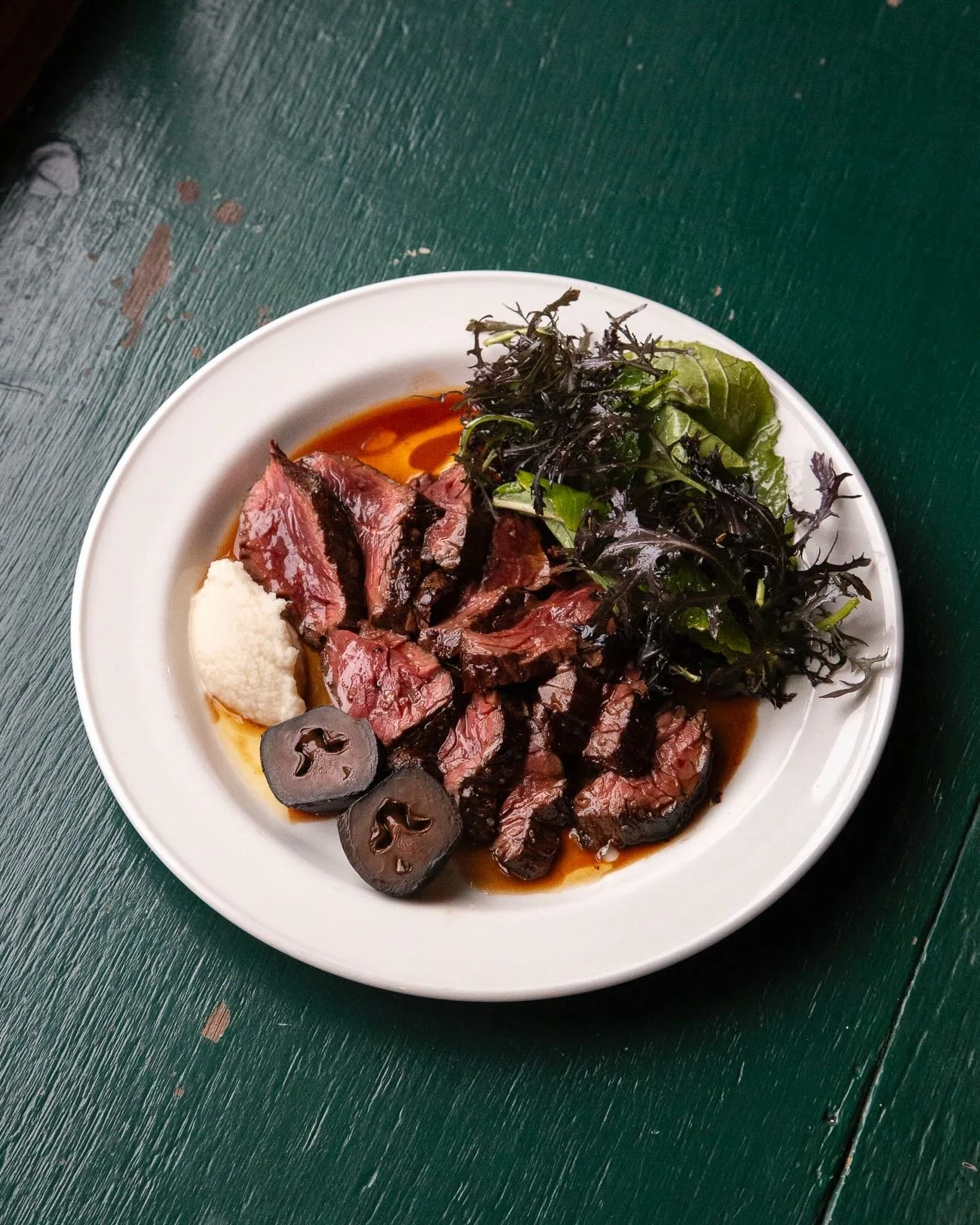 Onglet with horseradish, pickled walnut and mustard leaves from @aral.farm , inspired by the wonderful @jeremyleeqv. Onglet is a cut of beef that comes the diaphragm, due to its location it is incredibly delicious. It&rsquo;s a fibrous cut that needs