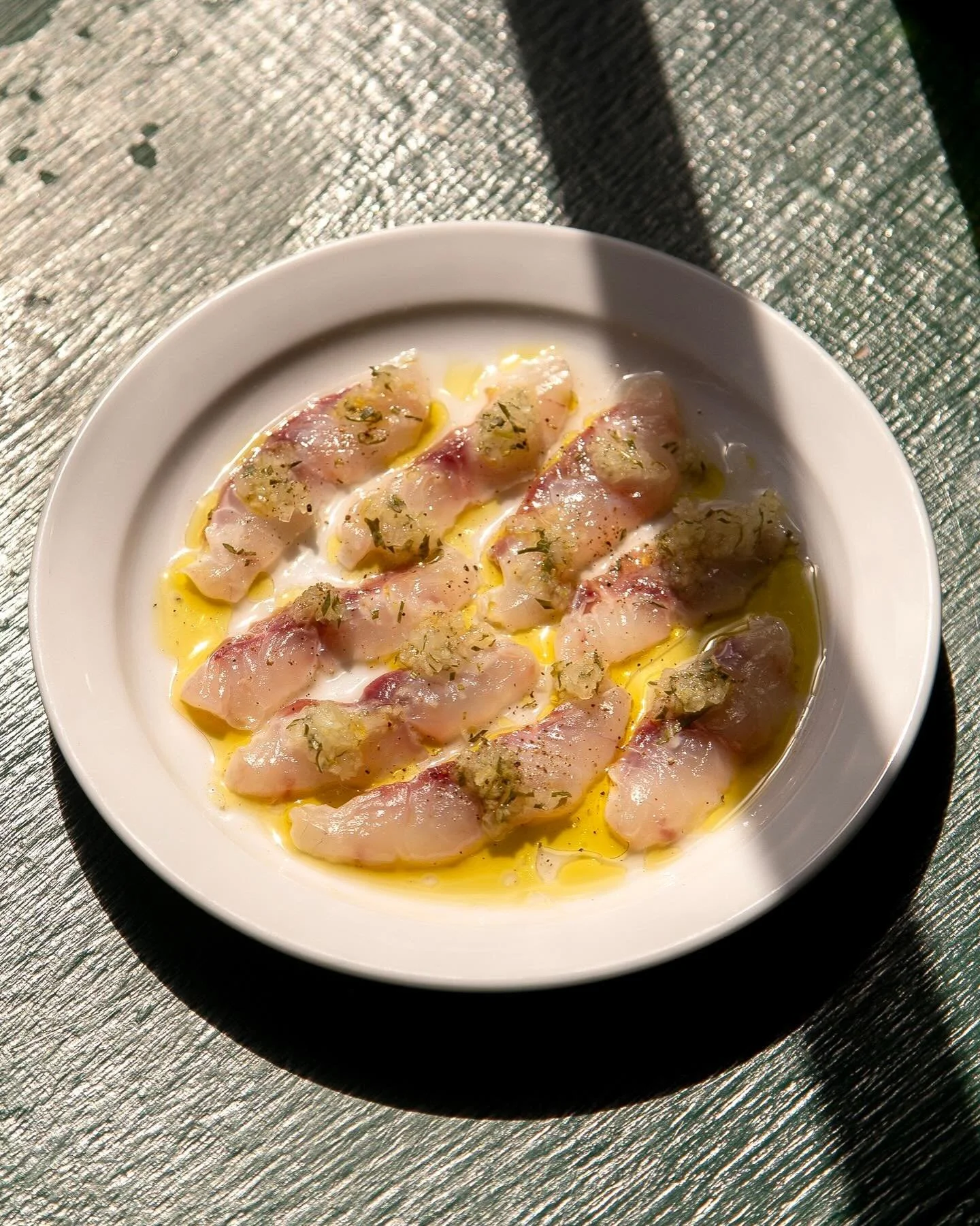 Bass crudo with apple mignonette and olive oil. 

Here&rsquo;s that bass from @cornwallsustainablefish featured in our previous post. When you can work with fish of such supreme quality it makes sense to showcase it in a raw preparation. We make a mi
