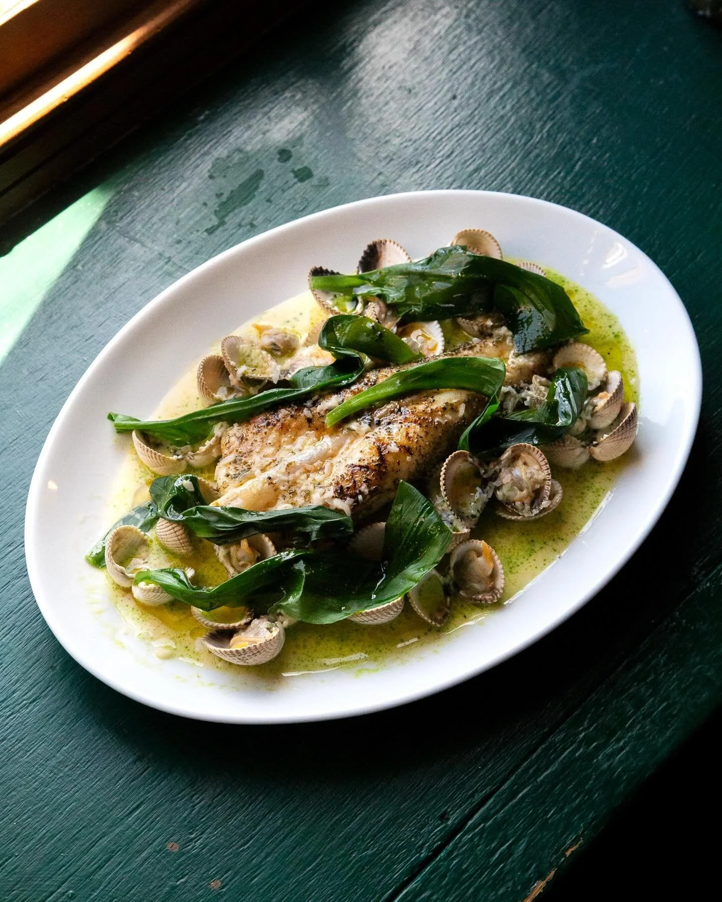 Grilled monkfish, cockles, wild garlic and a butter sauce. A quick outing was had in Zoe&rsquo;s &lsquo;09 Citroen Xsara Picasso, &lsquo;Pablo&rsquo;, to fetch some wild garlic not far from the pub. We used it to add springtime pungency in to this di