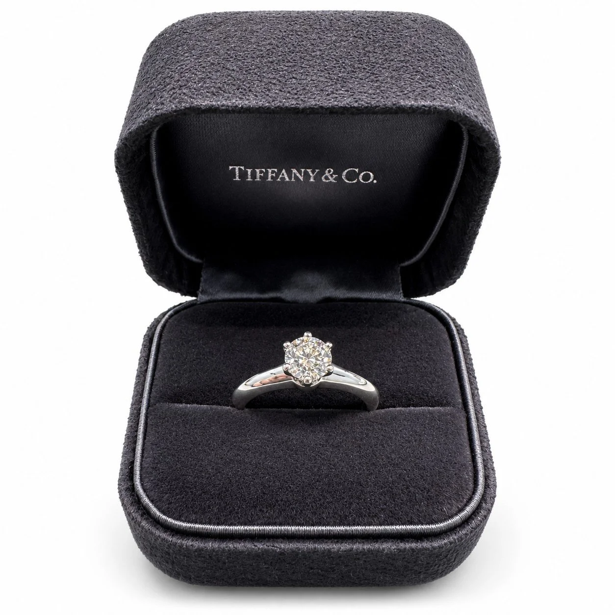 Diamond ring in open Tiffany box.jpg