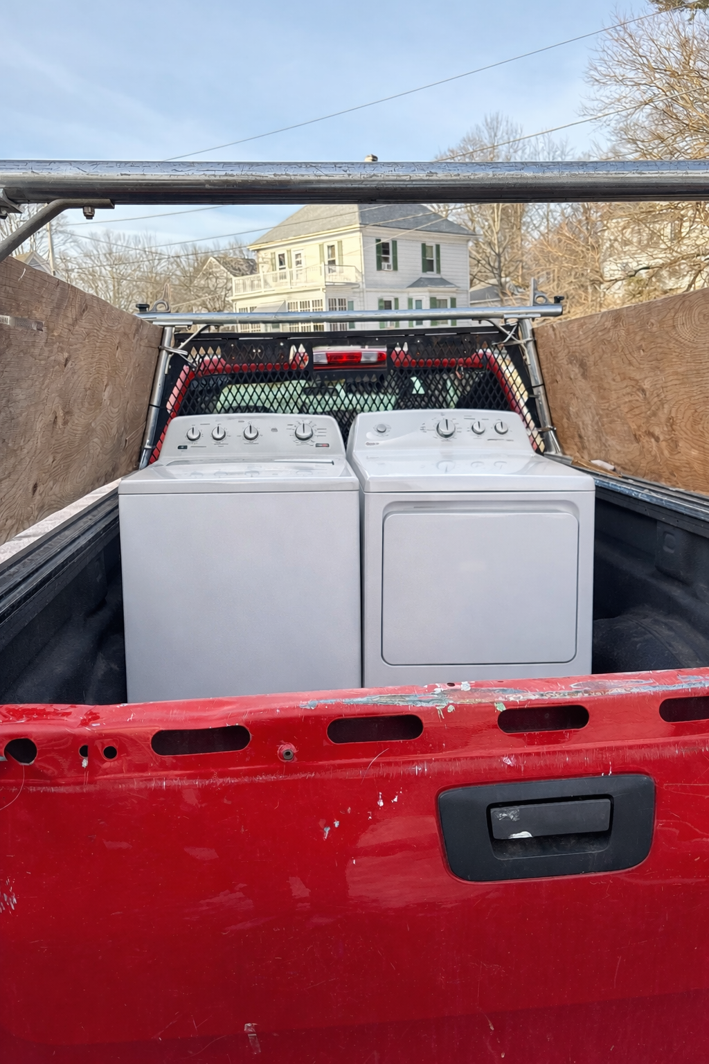 Washer and Dryer in the back of a pickup truck