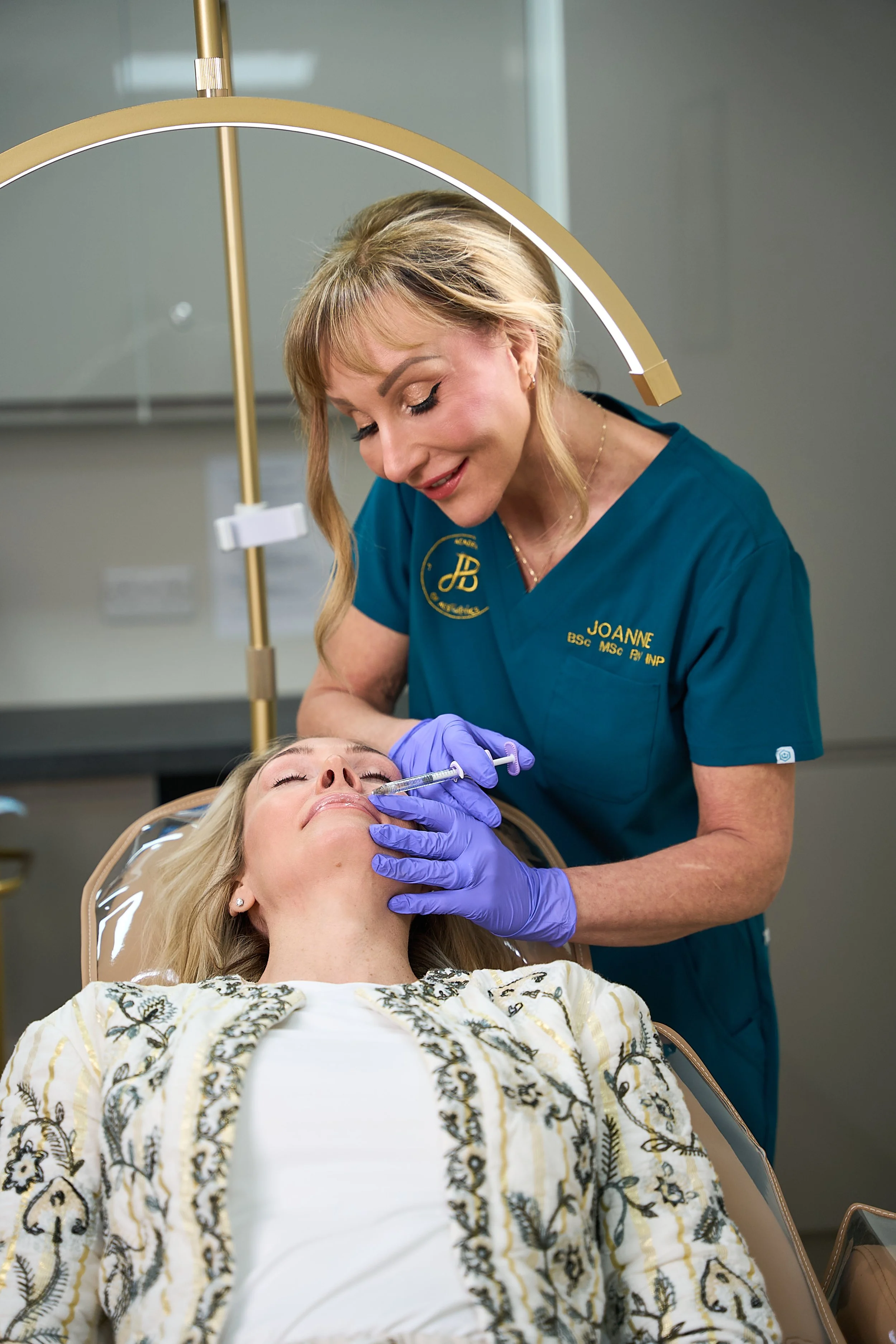Aesthetics practitioner, Joanne Brannan, administering treatment, JB Academy of Aesthetics, Kirkintilloch Glasgow