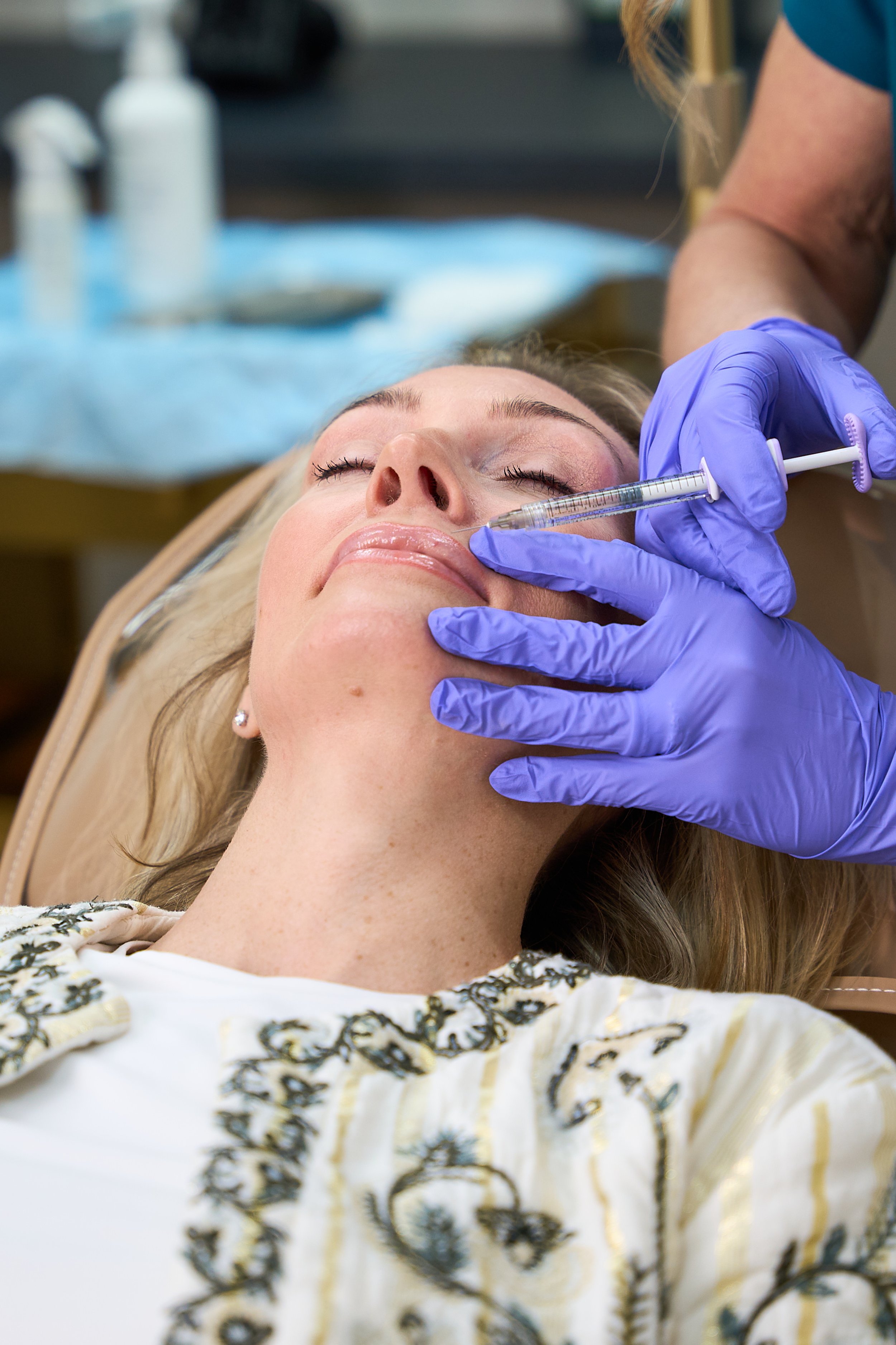 woman receiving aesthetics treatment in clinic, JB Academy of Aesthetics, Kirkintilloch Glasgow
