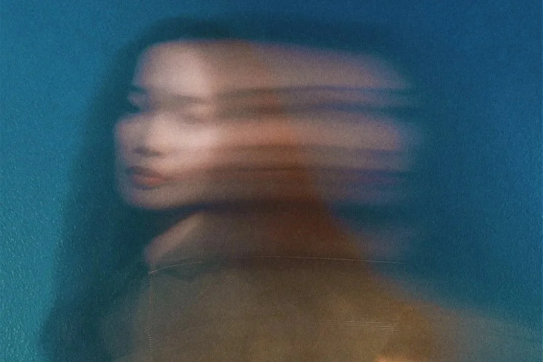 Blurred woman during dissociation dealing with cptsd