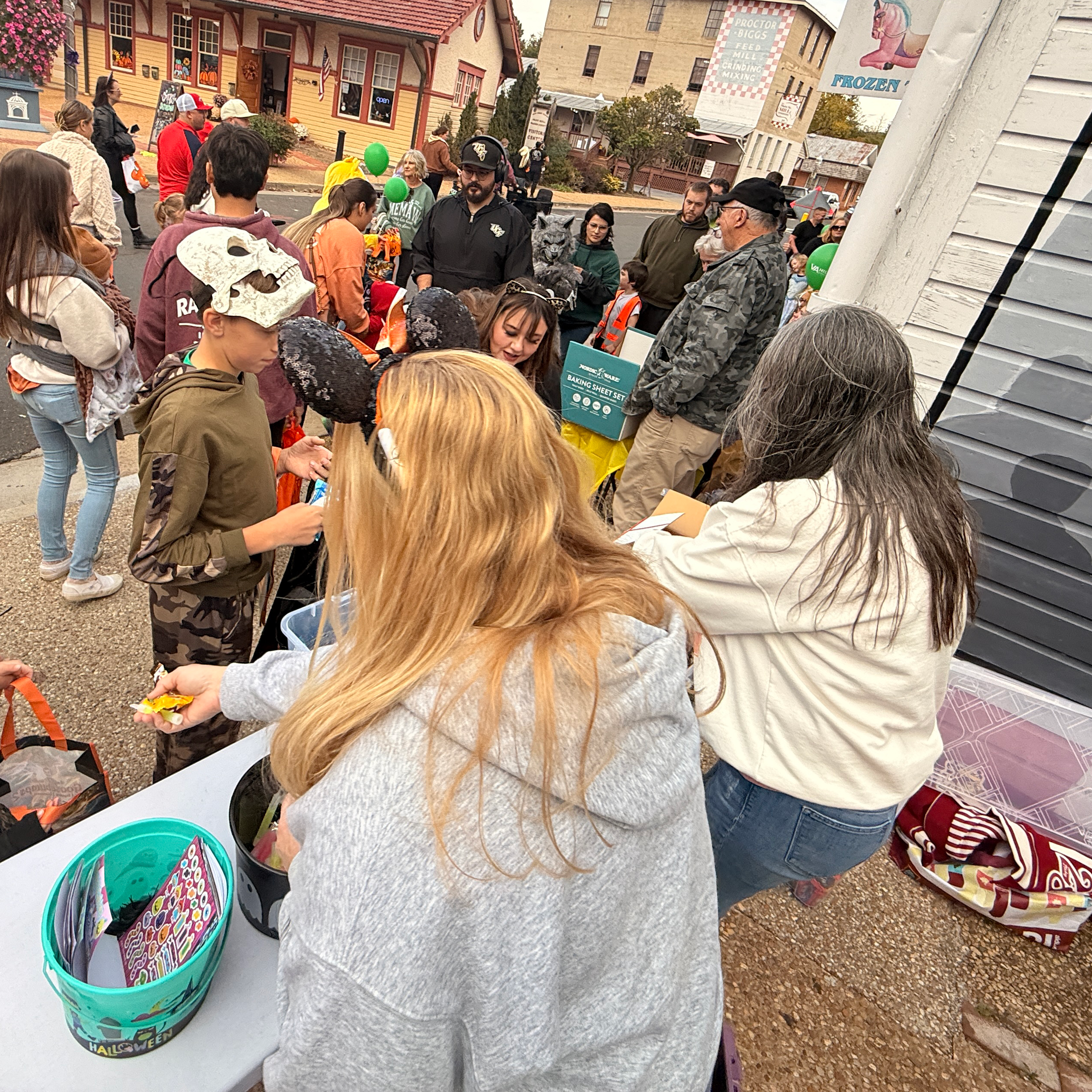 Handing out candy at the annual Main Street Halloween event.