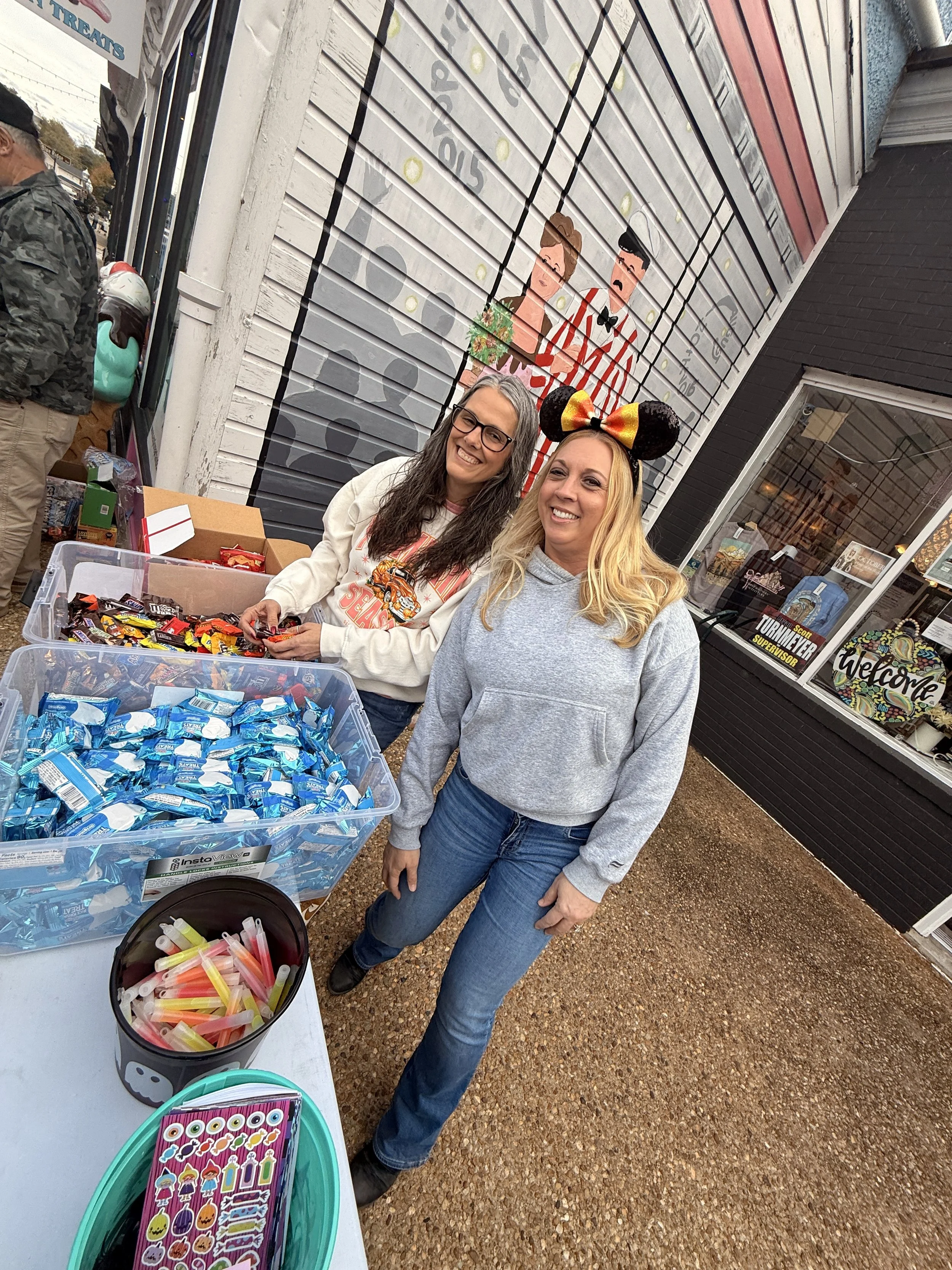 Ruritan Members Pam and Stephanie handing out candy at Halloween