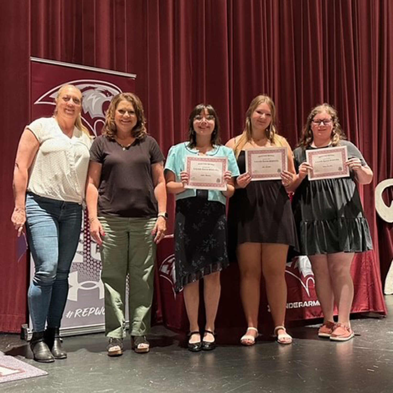 Our volunteers handing our scholarships each year.