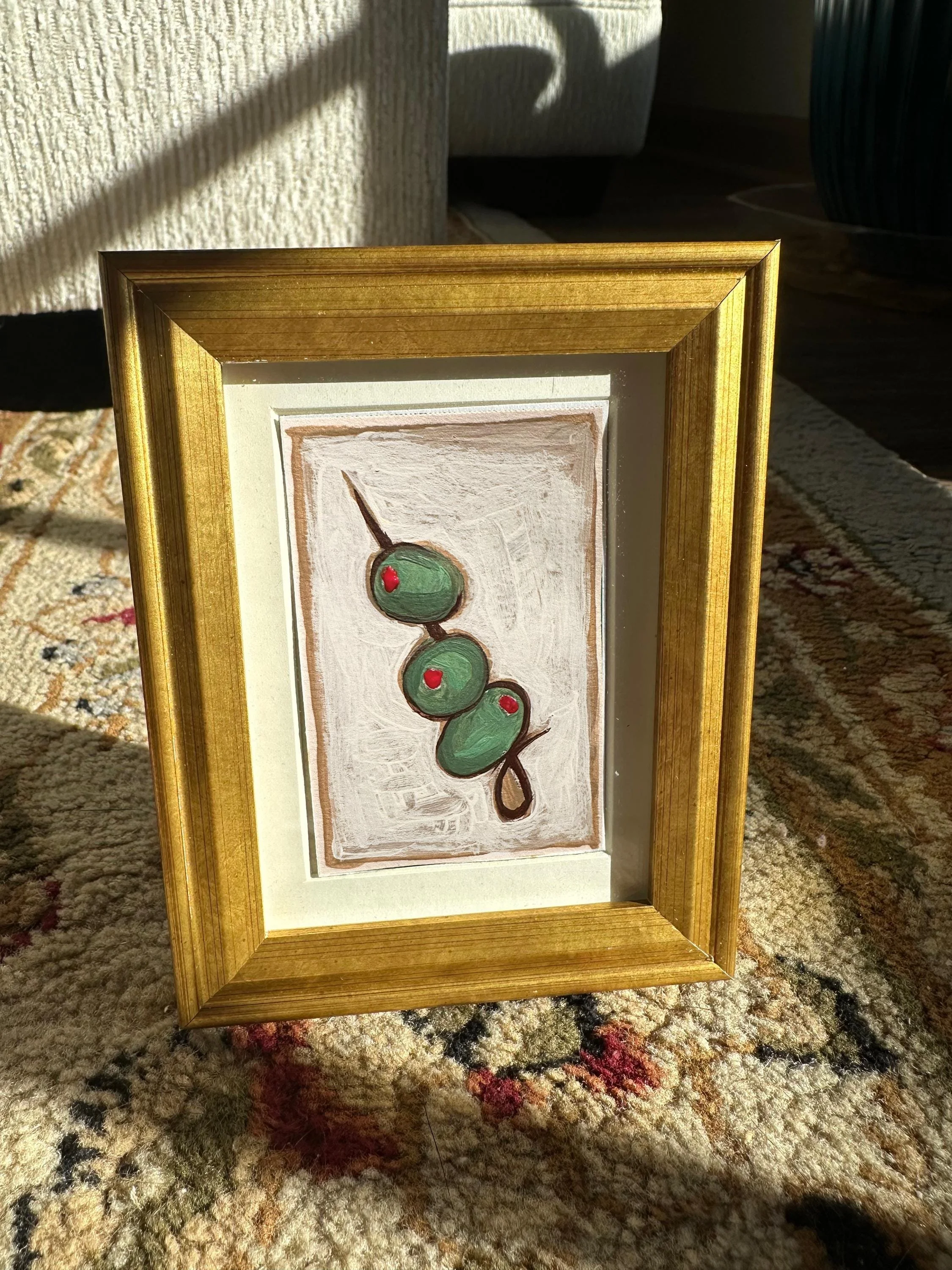 Vintage olive-themed art print with classic styling.