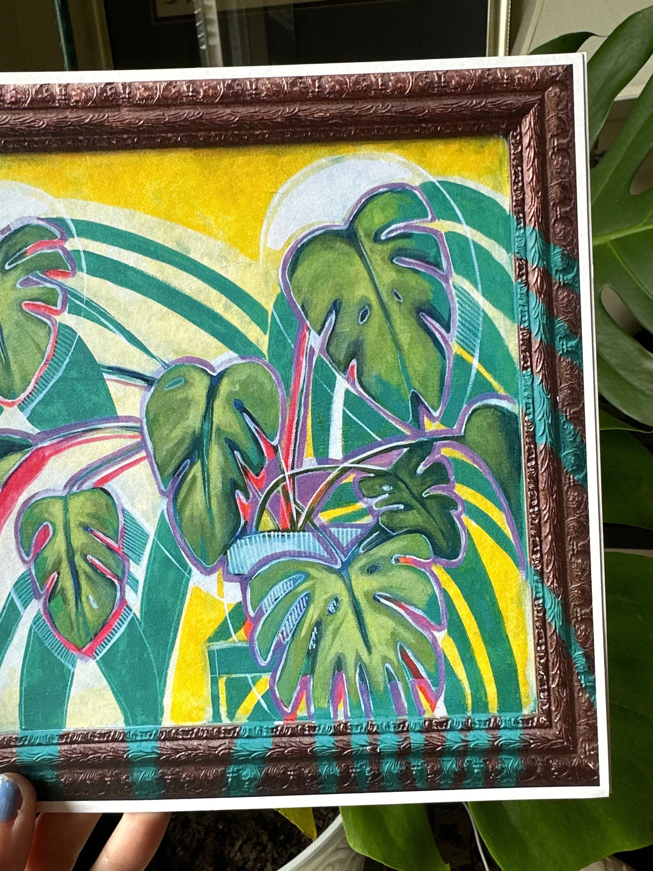 Colorful painting of a monstera plant with vibrant green leaves