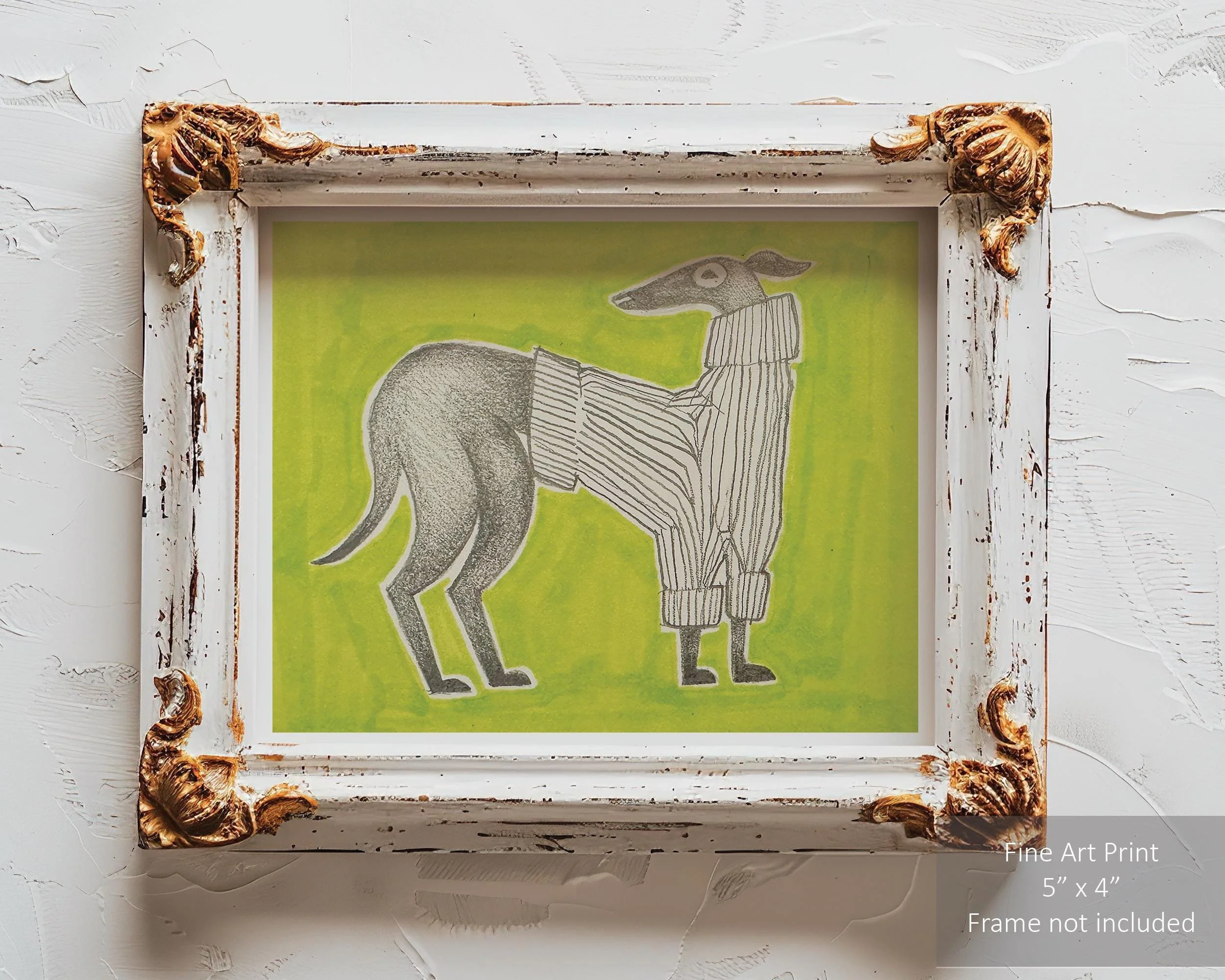 Greyhound dog wearing a cozy sweater on a solid green background.