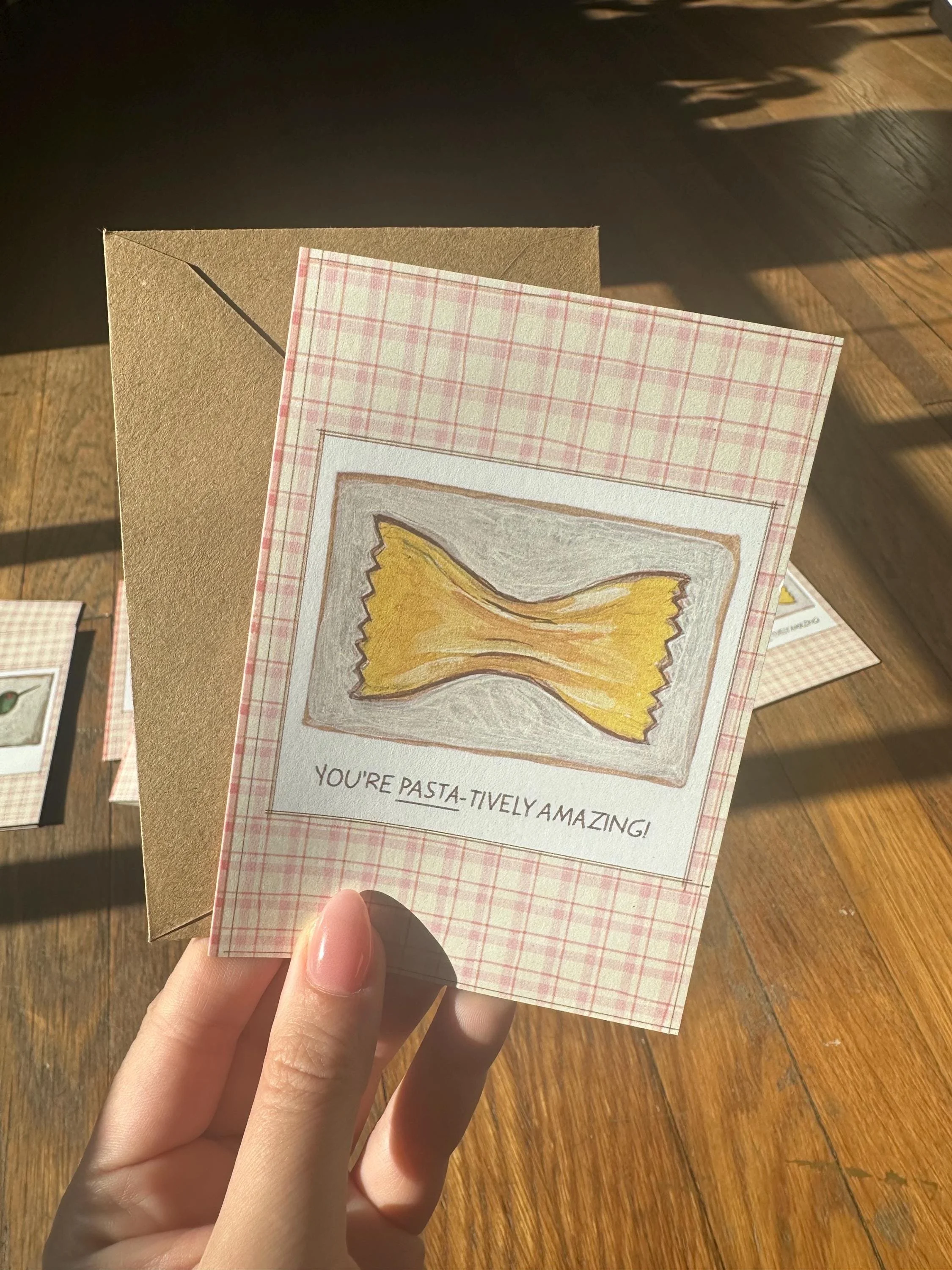 Stationery set featuring kitchen-themed art prints with colorful illustrations.