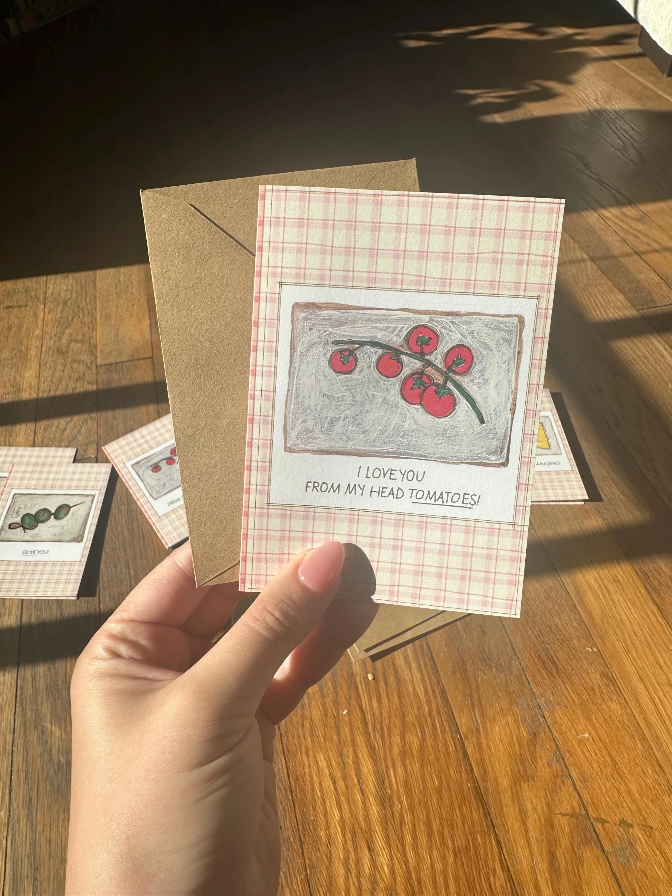 Stationery set featuring kitchen-themed art prints with colorful illustrations.