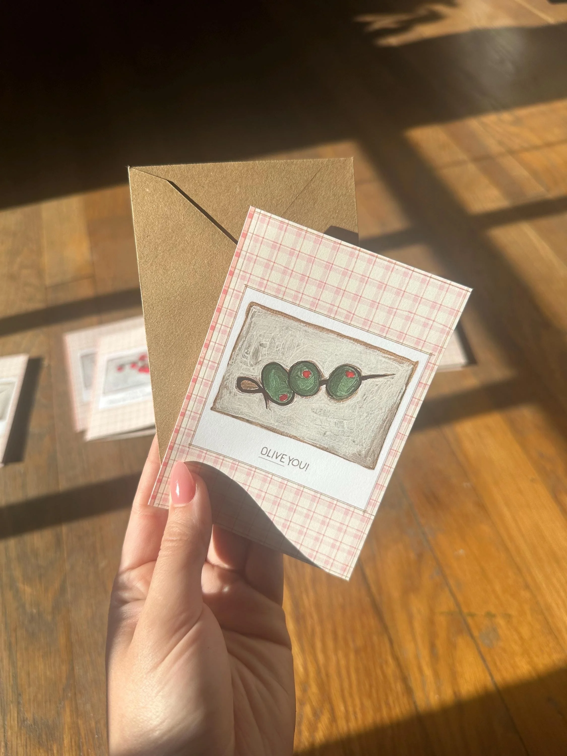Stationery set featuring kitchen-themed art prints with colorful illustrations.