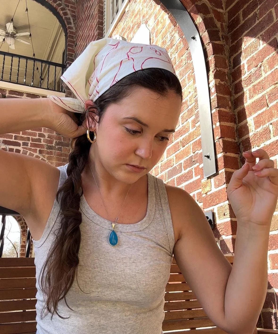White hand-painted bandana with red fruit illustrations.