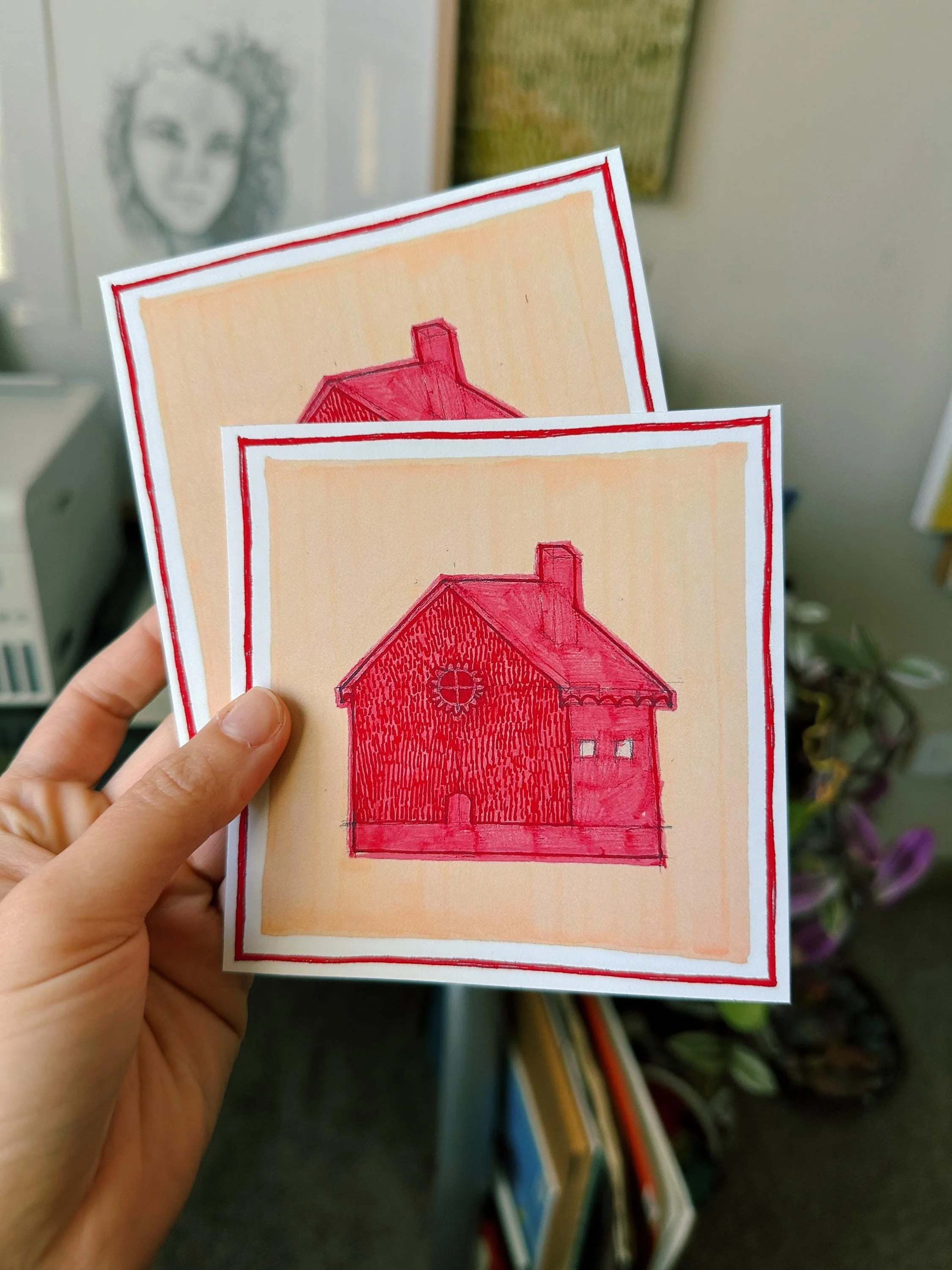 Red house painted against a bright yellow background.