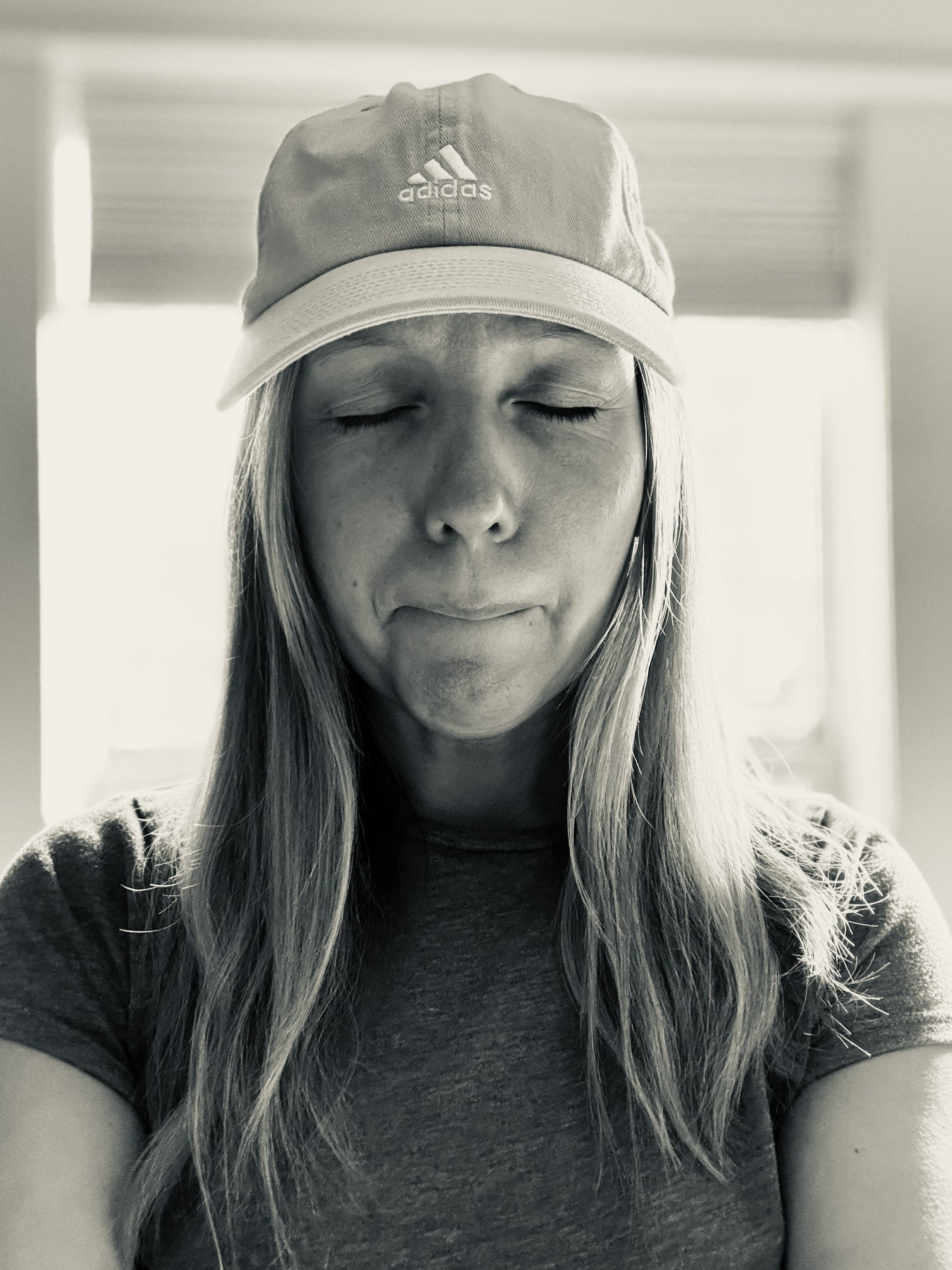 Jessi Bixler in black and white with eyes closed