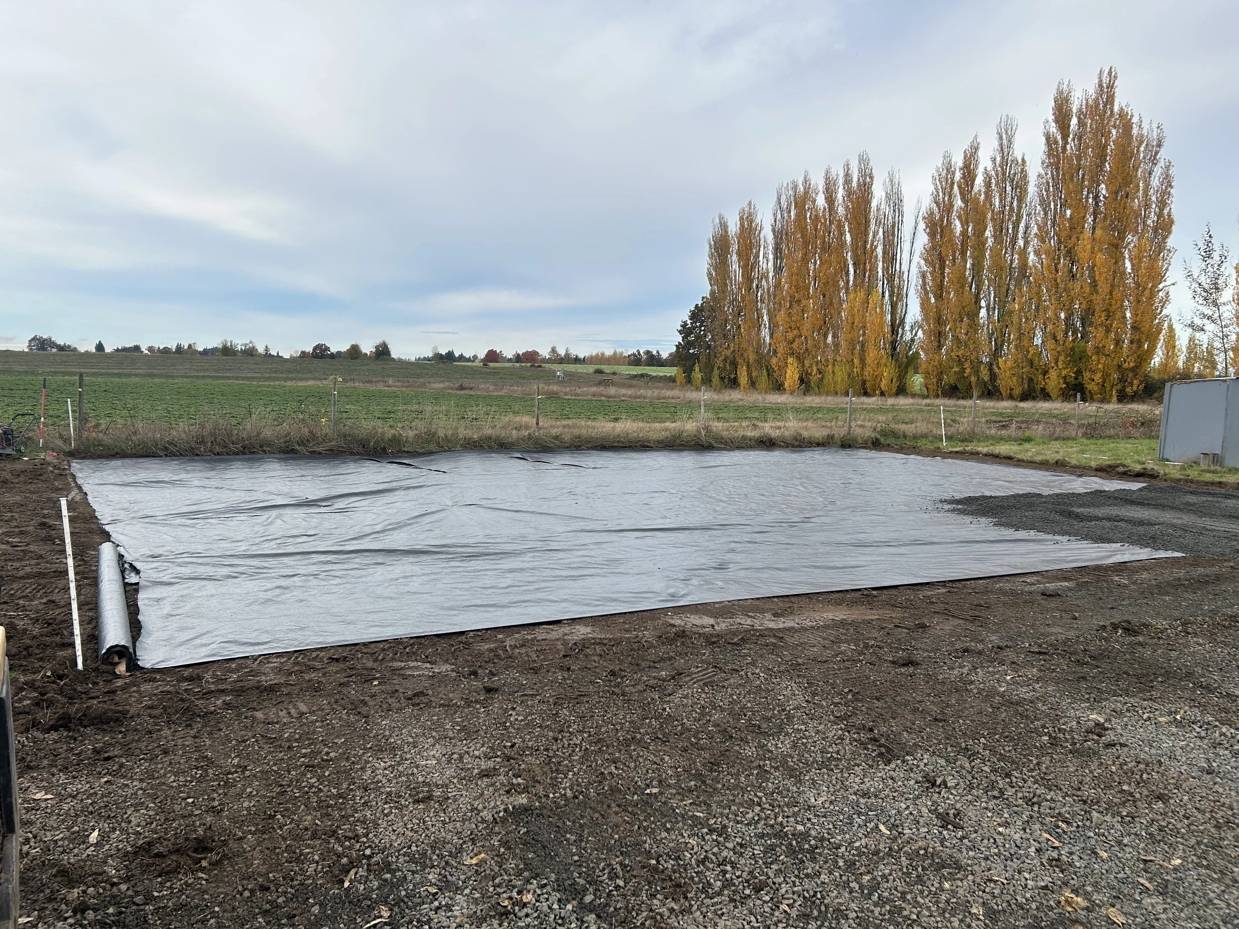 fabric laid down to prevent mud from rising into gravel