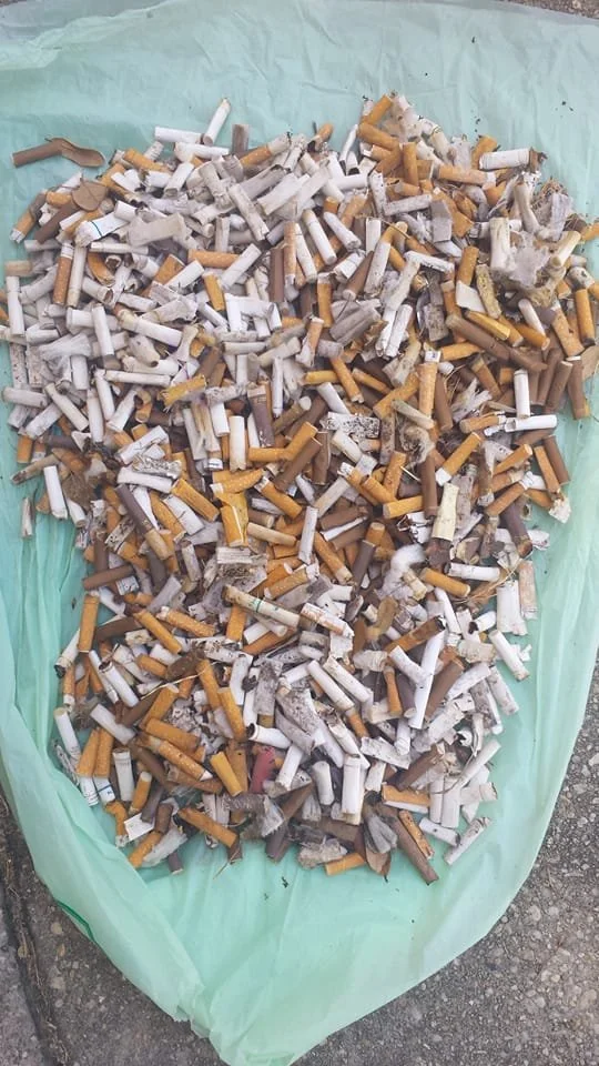 cigarettebutts_vertical_trashbag_oceanhour.jpg