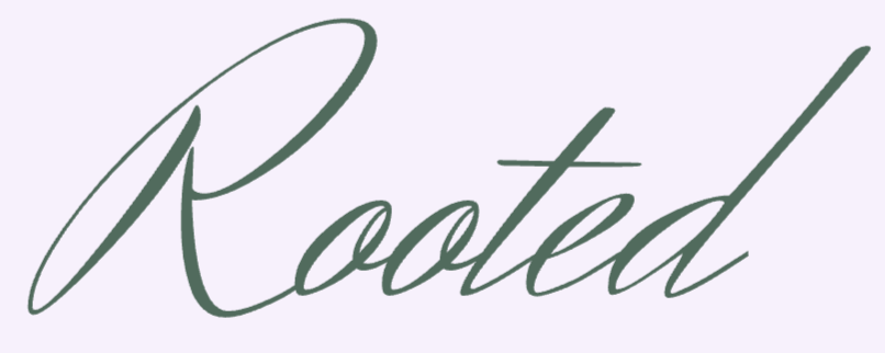 The word 'Rooted' written in elegant, cursive font on a light background.