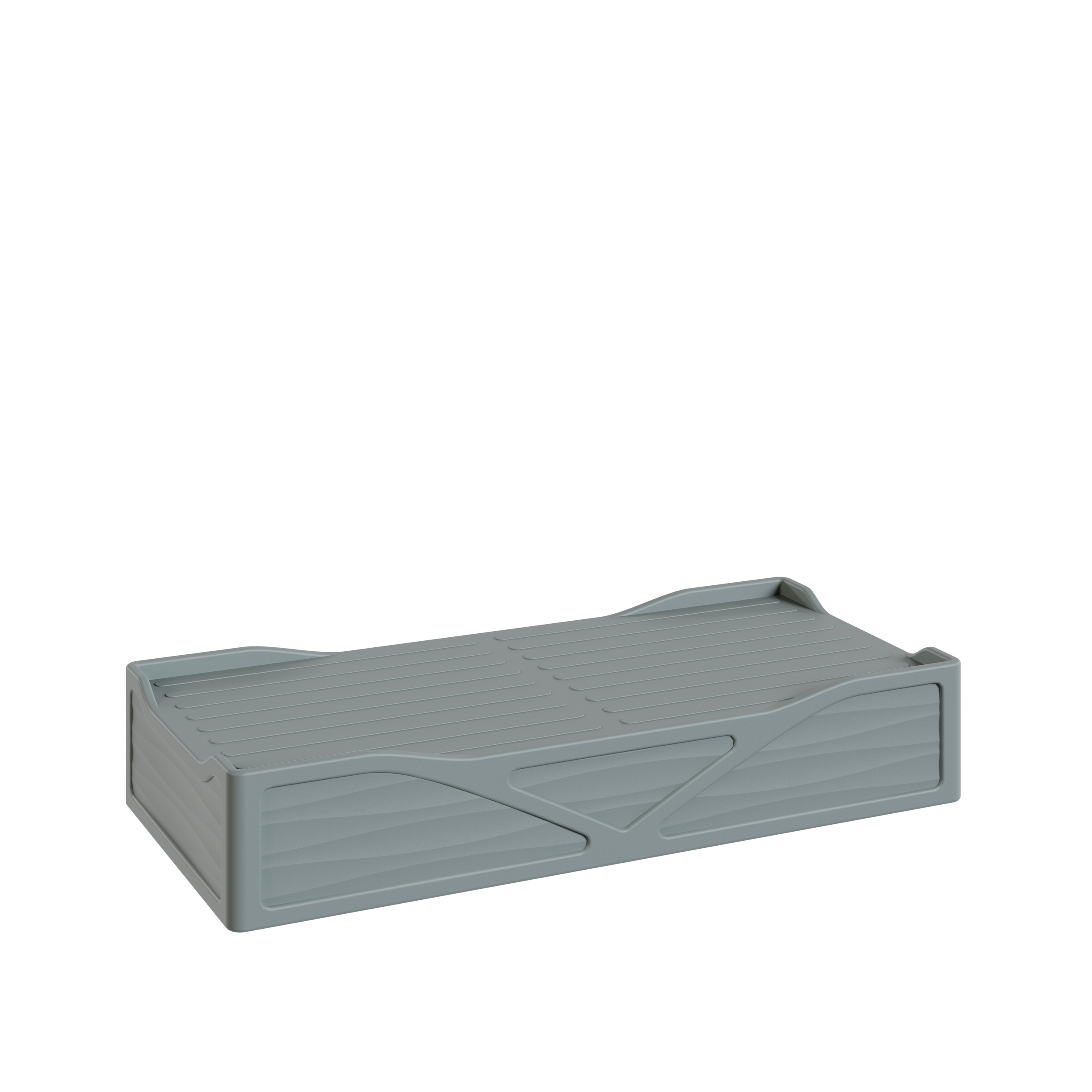 Une plateforme grise en plastique avec des motifs légèrement incurvés et des lignes de texture.