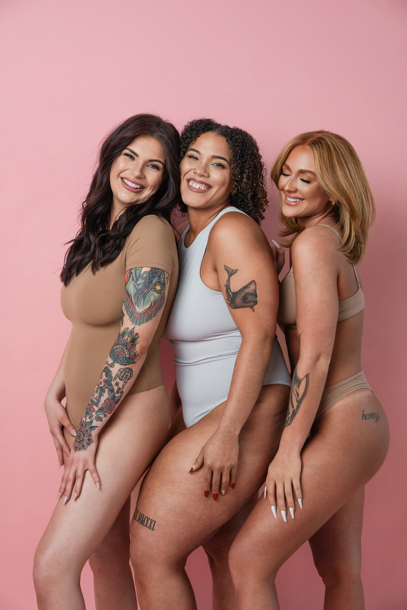 three clients smiling after a mobile spray tan in Port St. Lucie - The Glow Haven