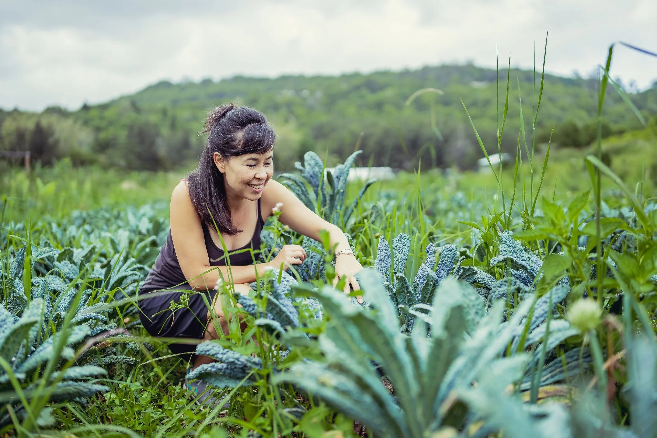 ce344b1-7448-fc-00f-ecad8e88cdf5_Kimberly_in_kale_garden.jpg