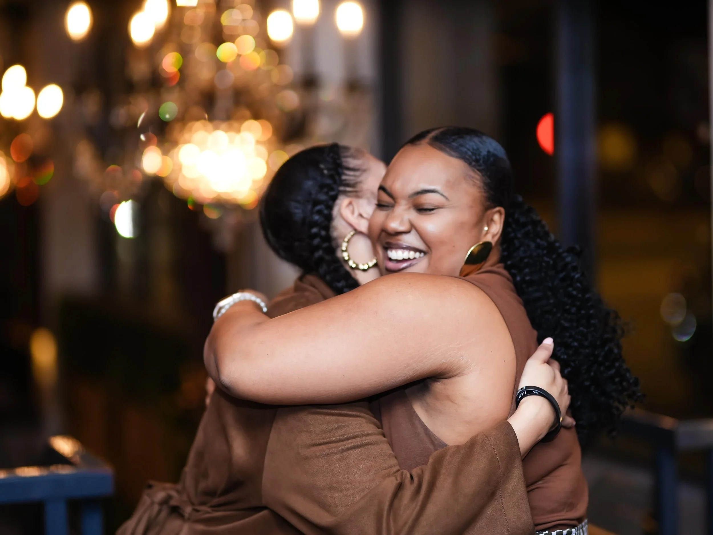 2 Mental health therapist hugging at the Threshold Social Align & Connect Event