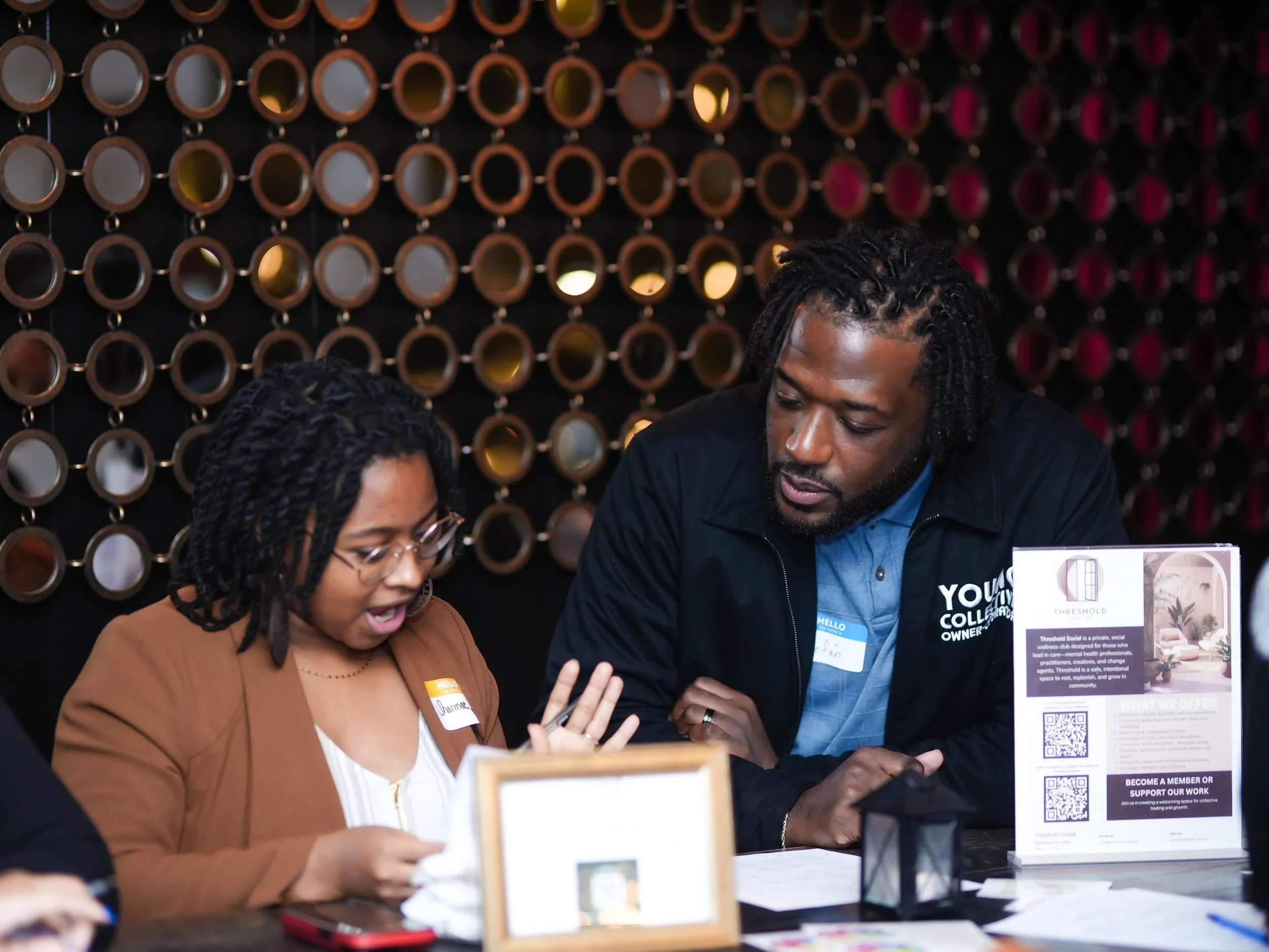 Two healthcare professionals engaged in conversation