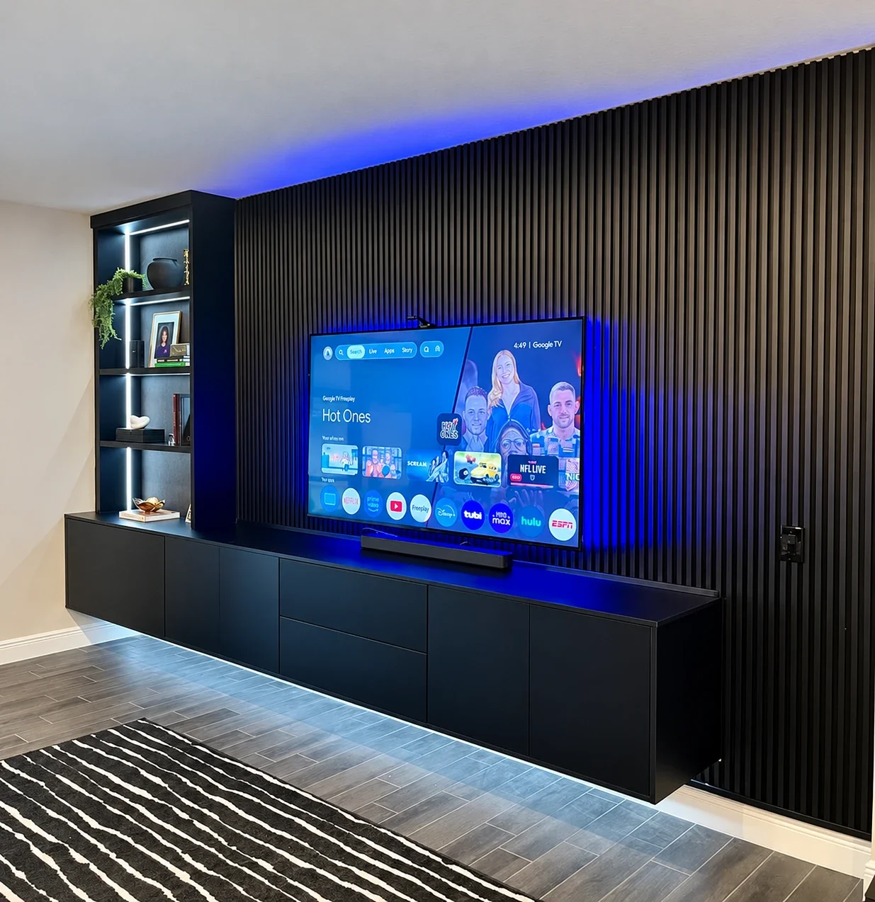 Custom Slat Media Wall with Floating Storage in Chicago
