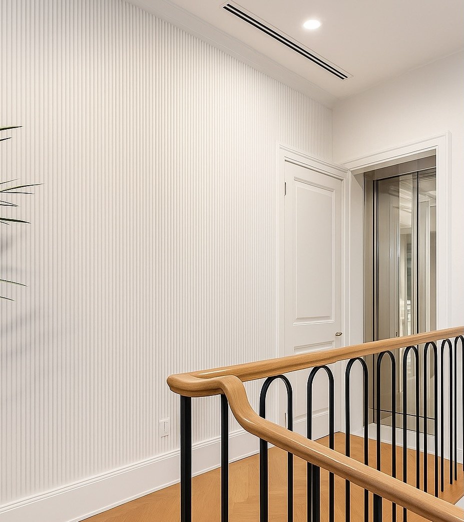 Minimalist Reeded Wall Panels in a Tampa Living Room.jpeg