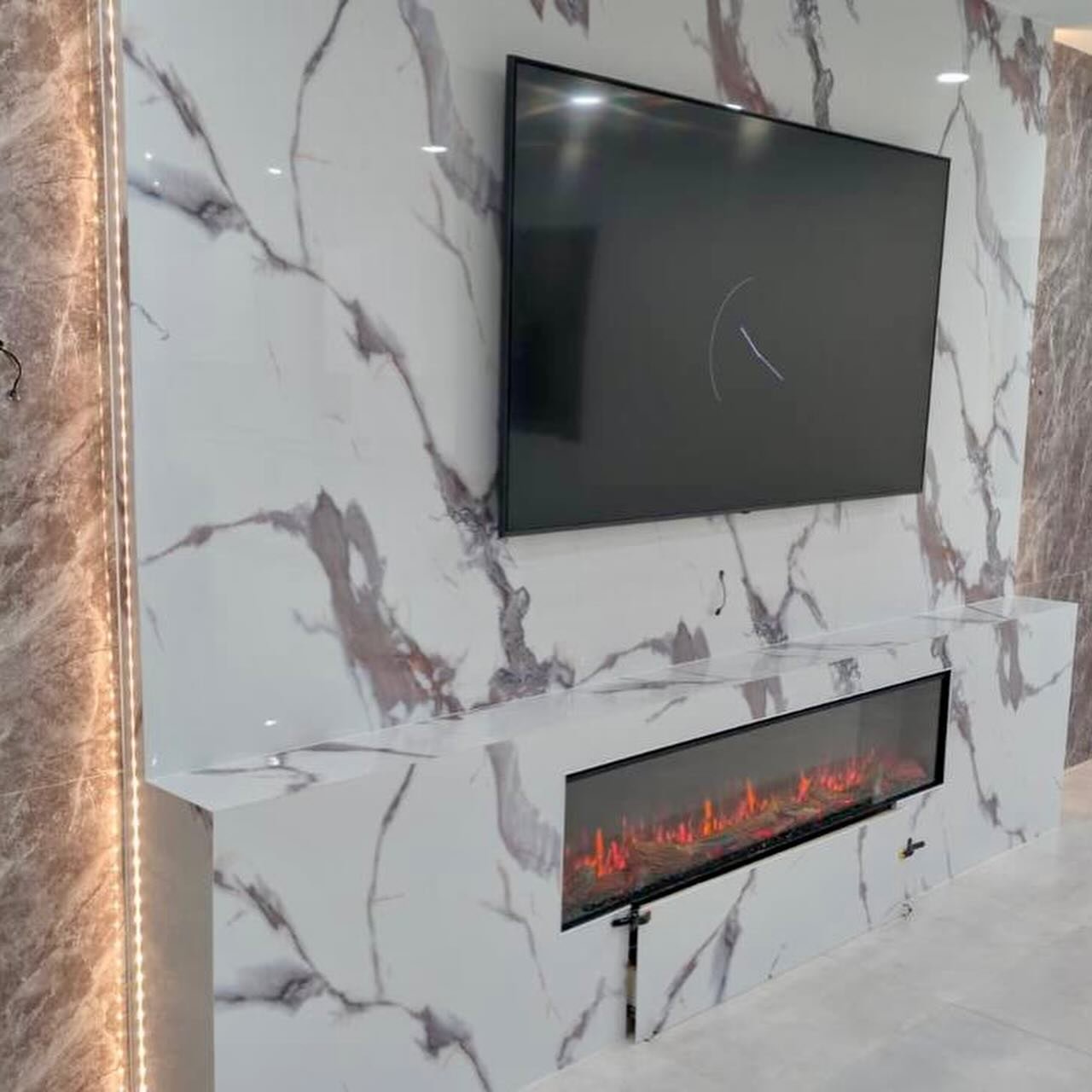 Luxury Marble Media &amp; Fireplace Wall with LED Columns &ndash; Miami, Florida | Avileve.com