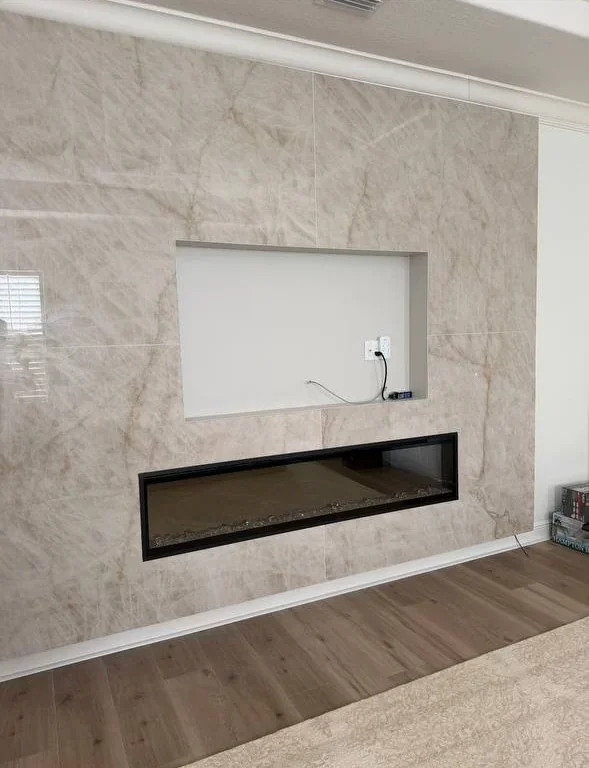los-angeles-media-wall-cladding-fireplace-installation.webp